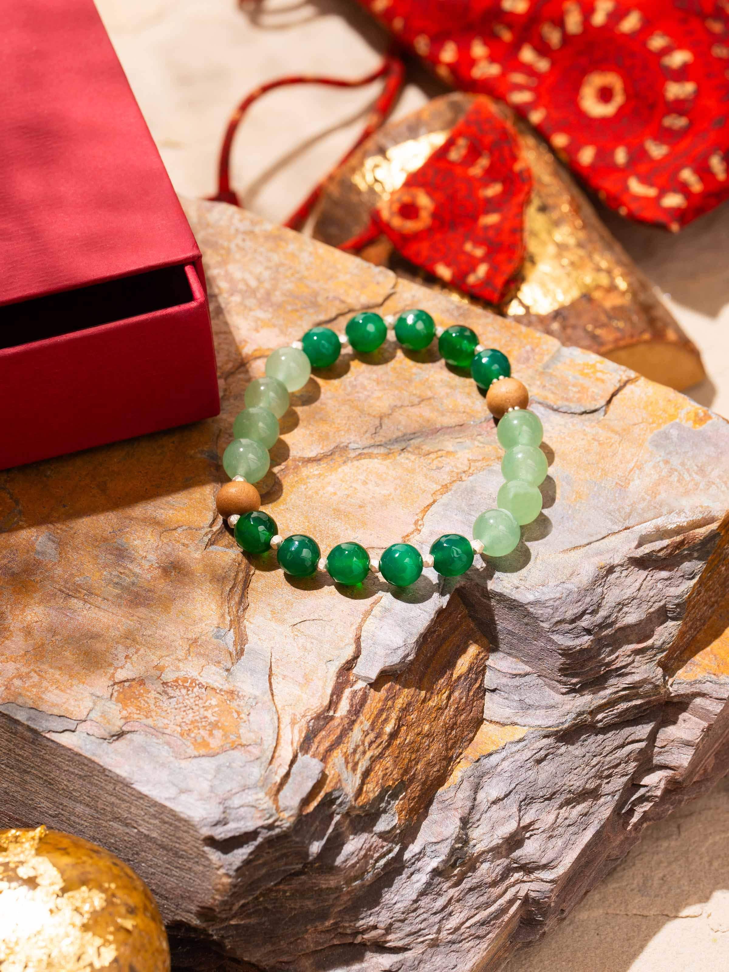 Side view of Green Aventurine & Green Onyx Bracelet highlighting polished beads and silver finish