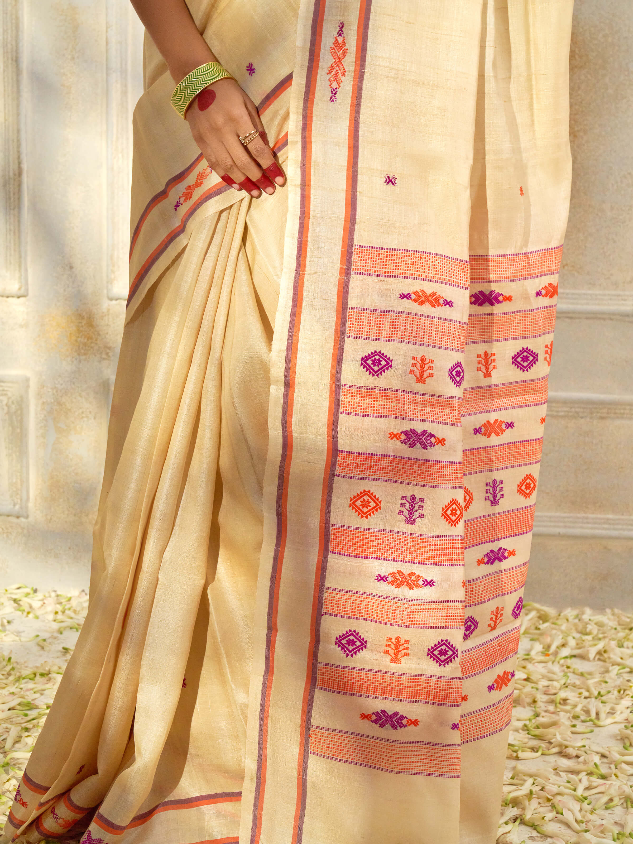 Detail view of off-white Tussar silk saree showcasing rich texture and craftsmanship