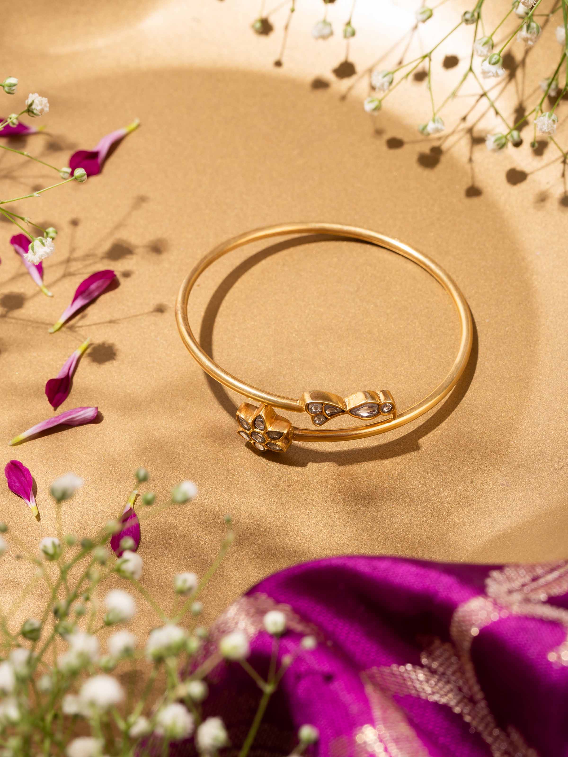 Side angle showing bracelet’s flexible design and intricate silver work