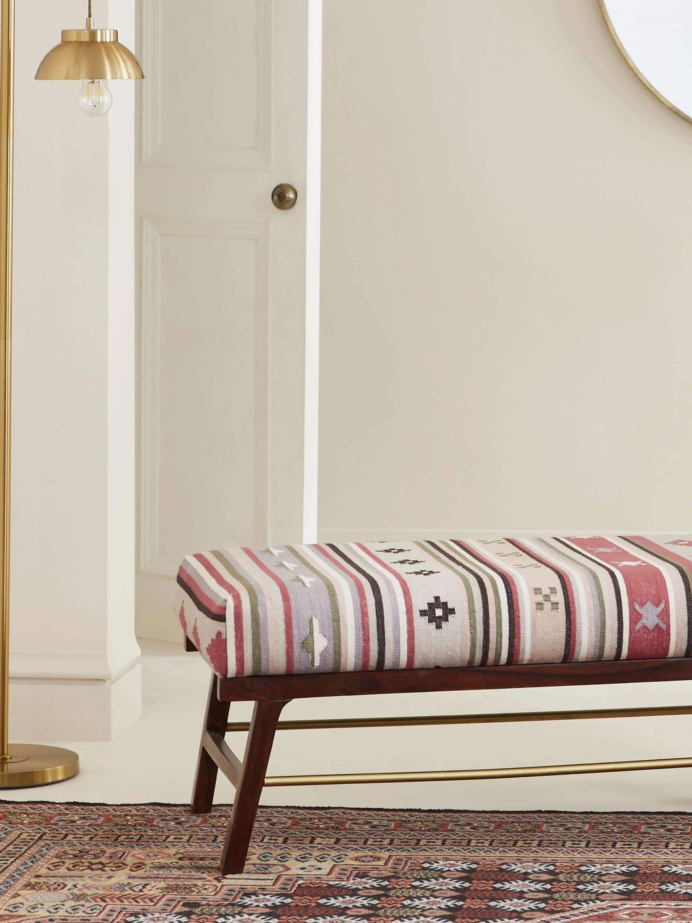 Side view of Panja Dhurrie Upholstered Sheesham Wood Bench, highlighting its traditional Dhurrie fabric and solid Sheesham wood frame.