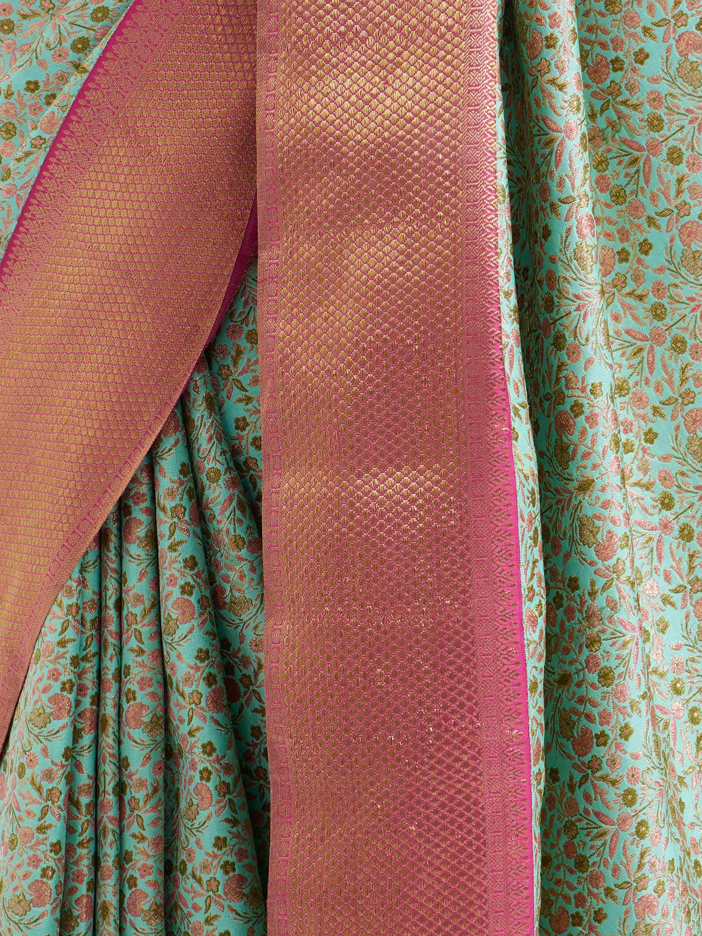 Detail view of sea green silk Kancheepuram saree showing silk texture and weaving details