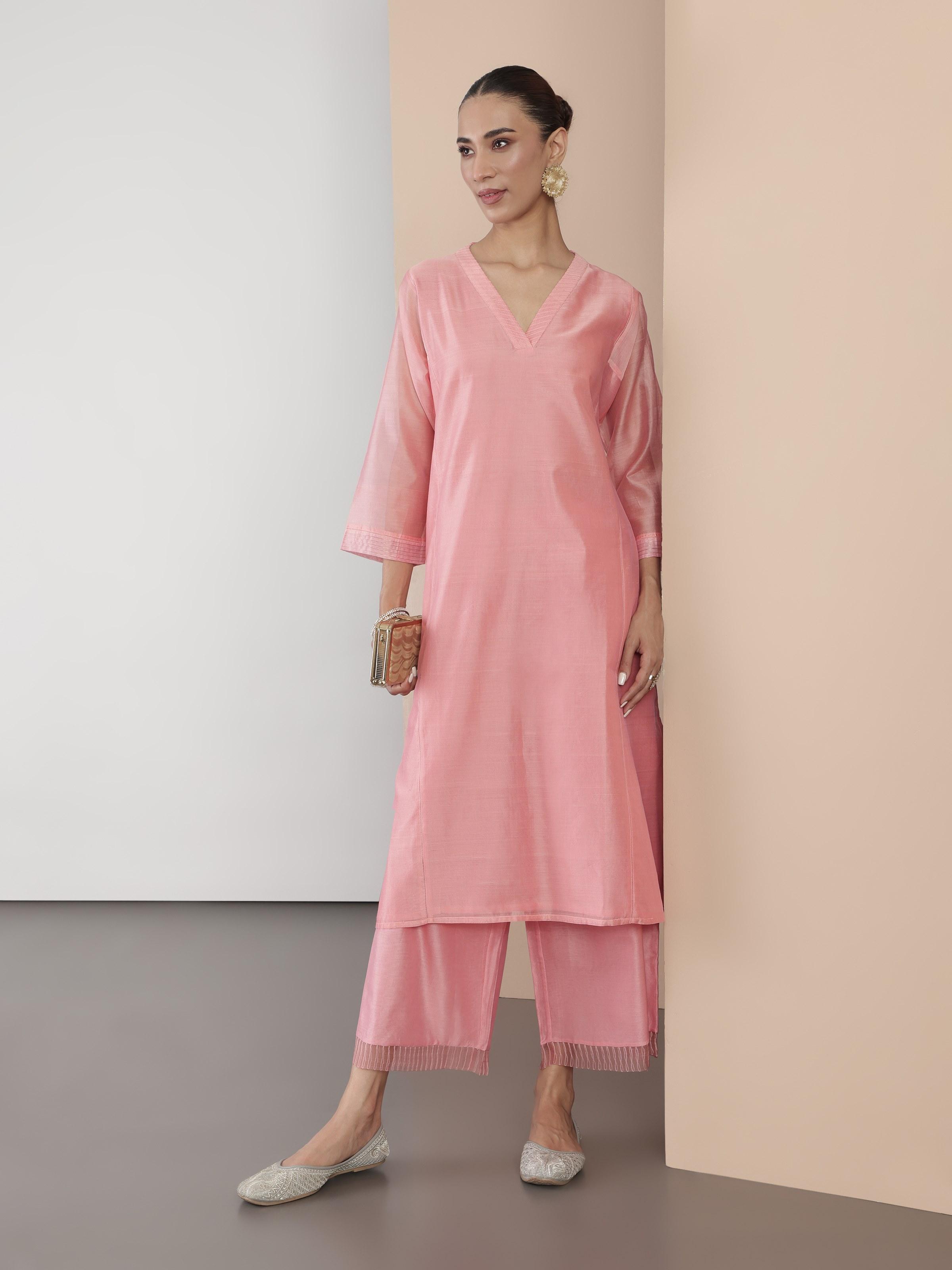 Model wearing pink Chanderi kurta in full-length side pose, showcasing its elegant drape.