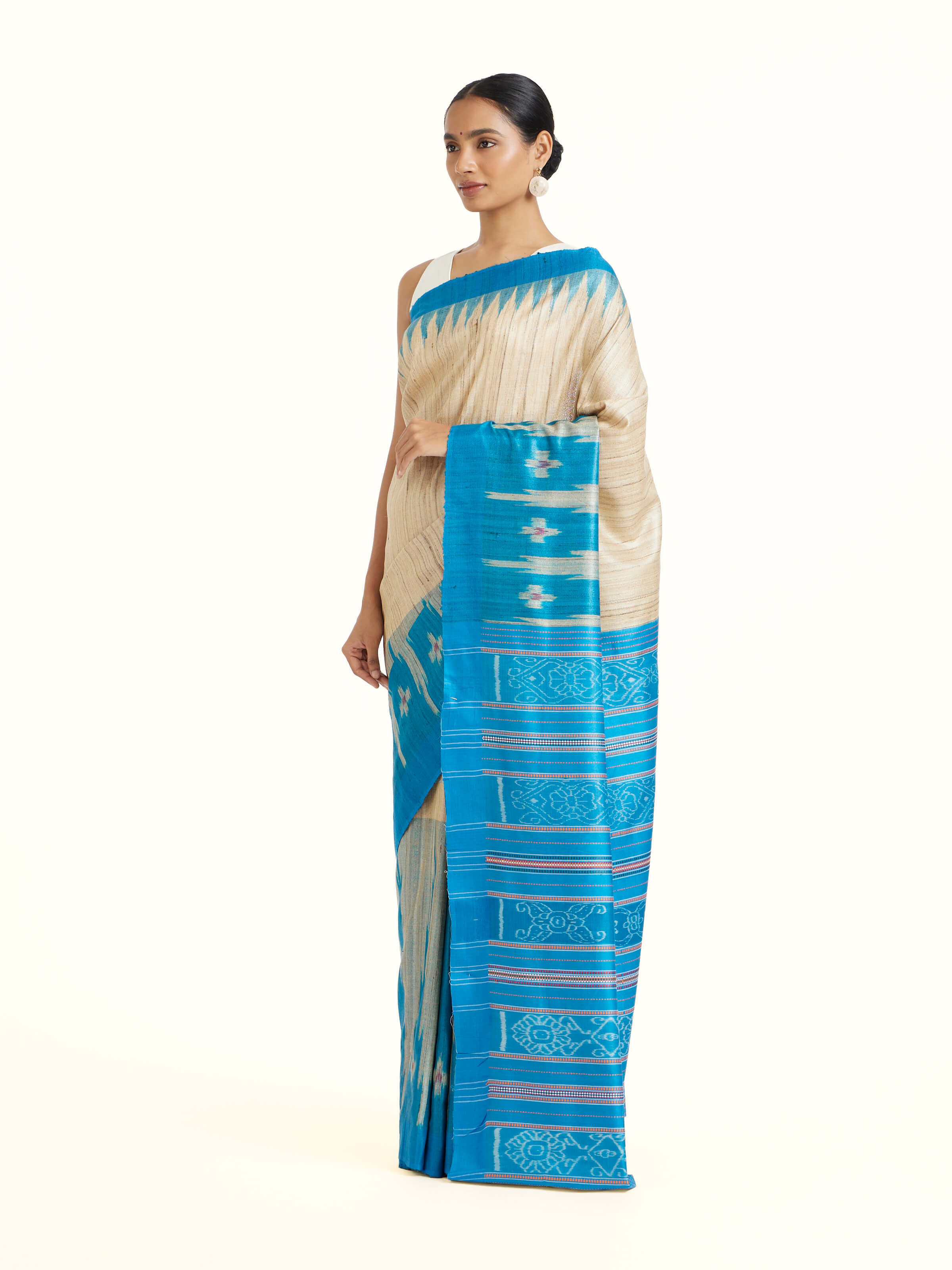 Side view of the Turquoise Tussar Ghicha Silk Bandha Ikat Saree