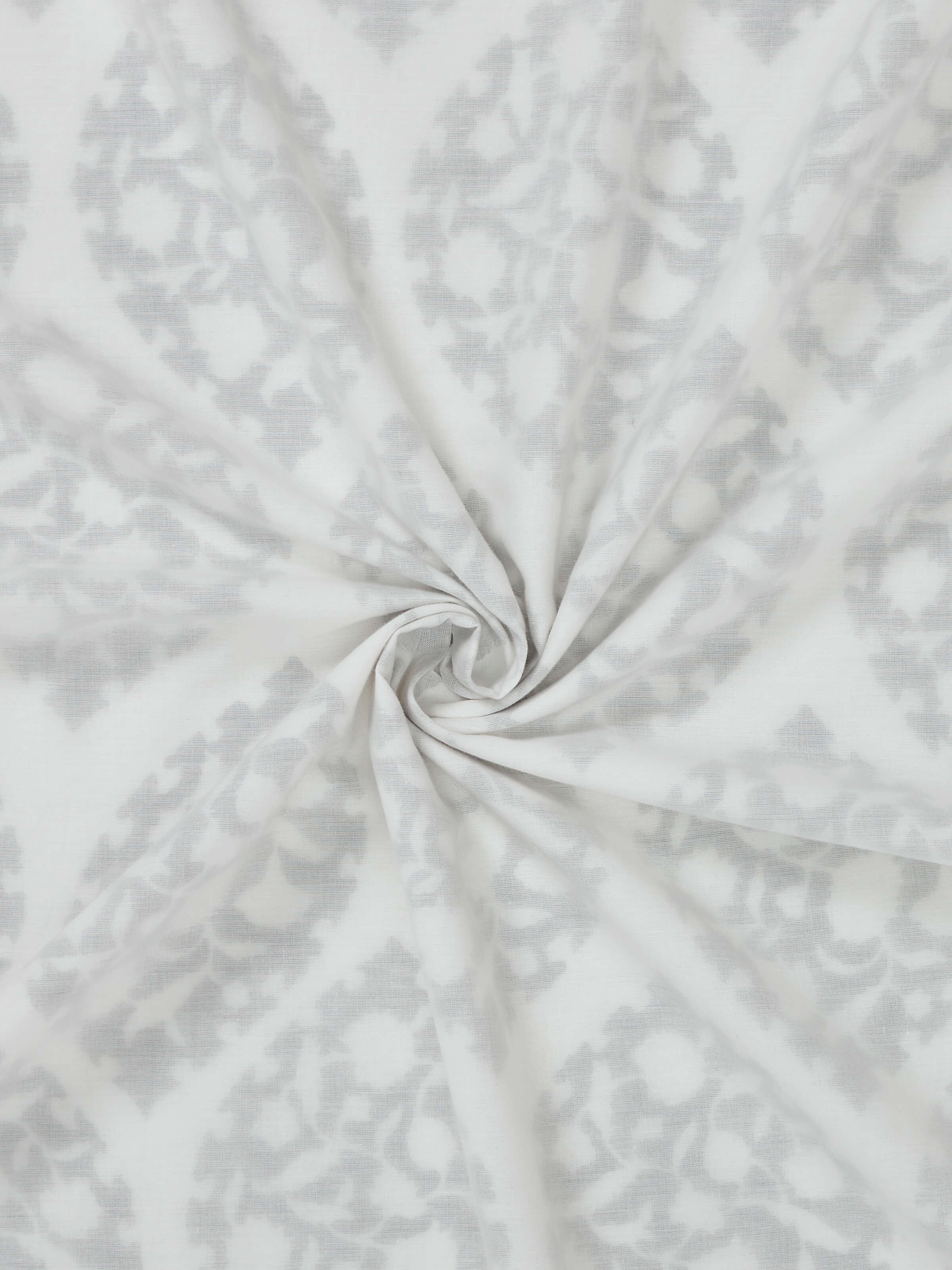 Detail shot capturing fine cotton weave and ogee block print detailing on Mihrab grey double dohar