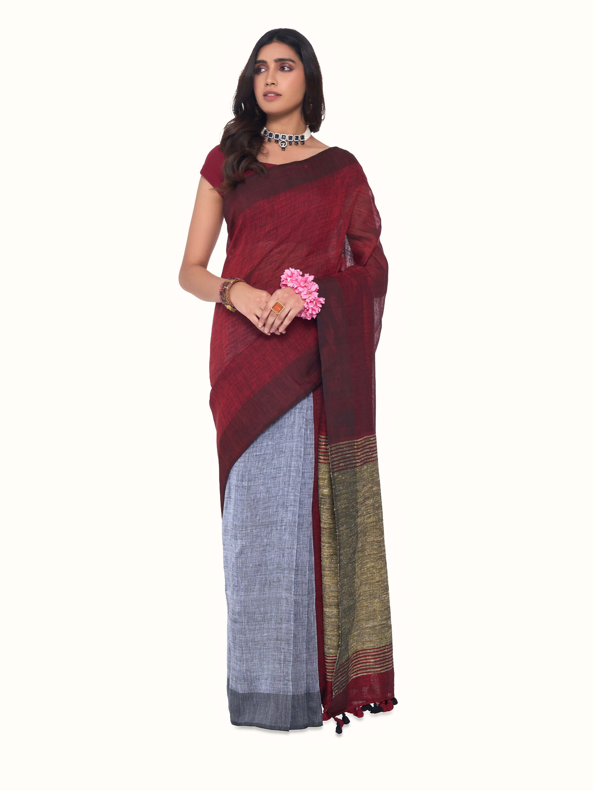 Front view of grey linen saree with subtle texture and minimal woven detailing
