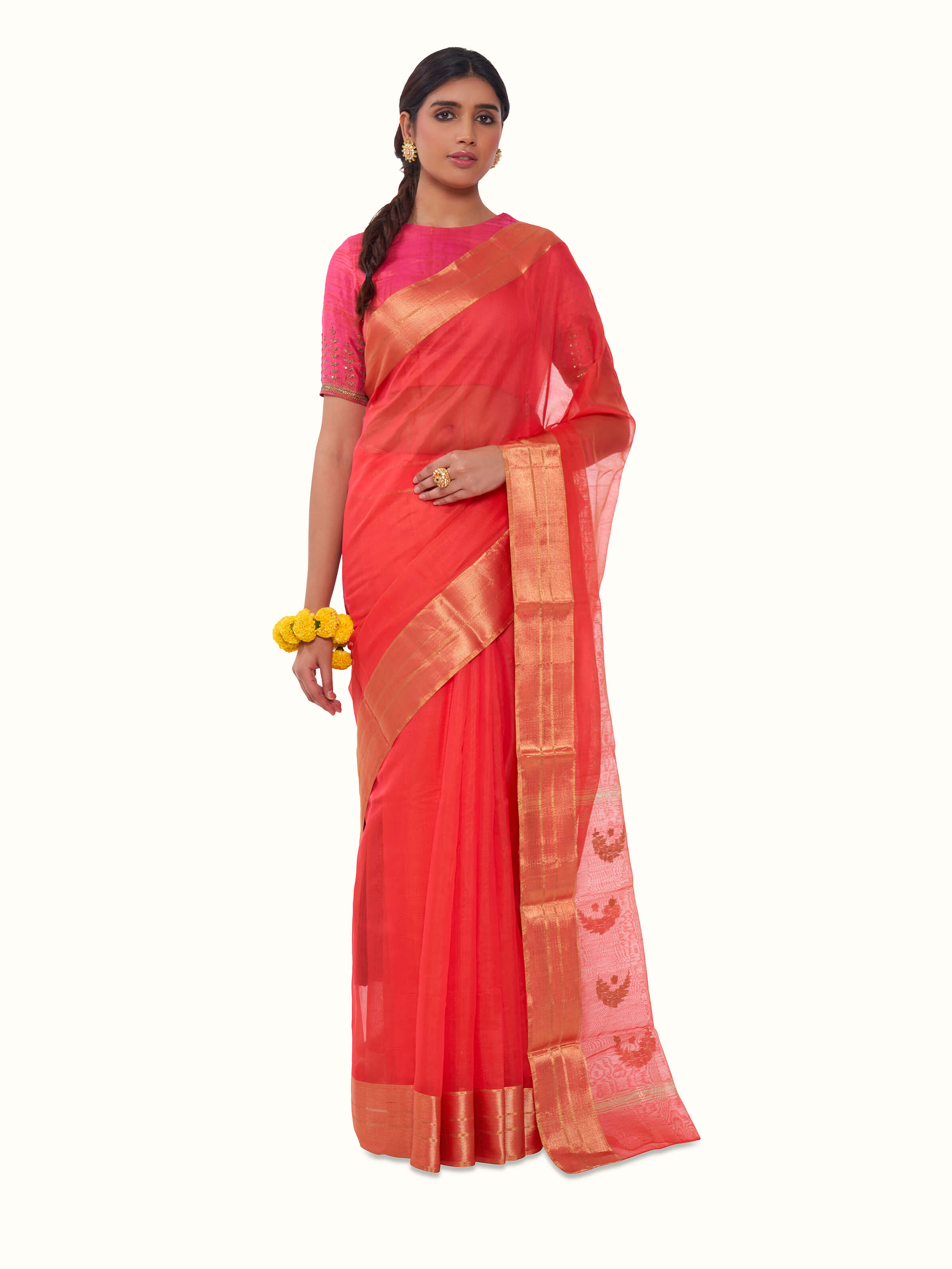Front view of coral mulberry silk Chanderi saree with elegant woven motifs