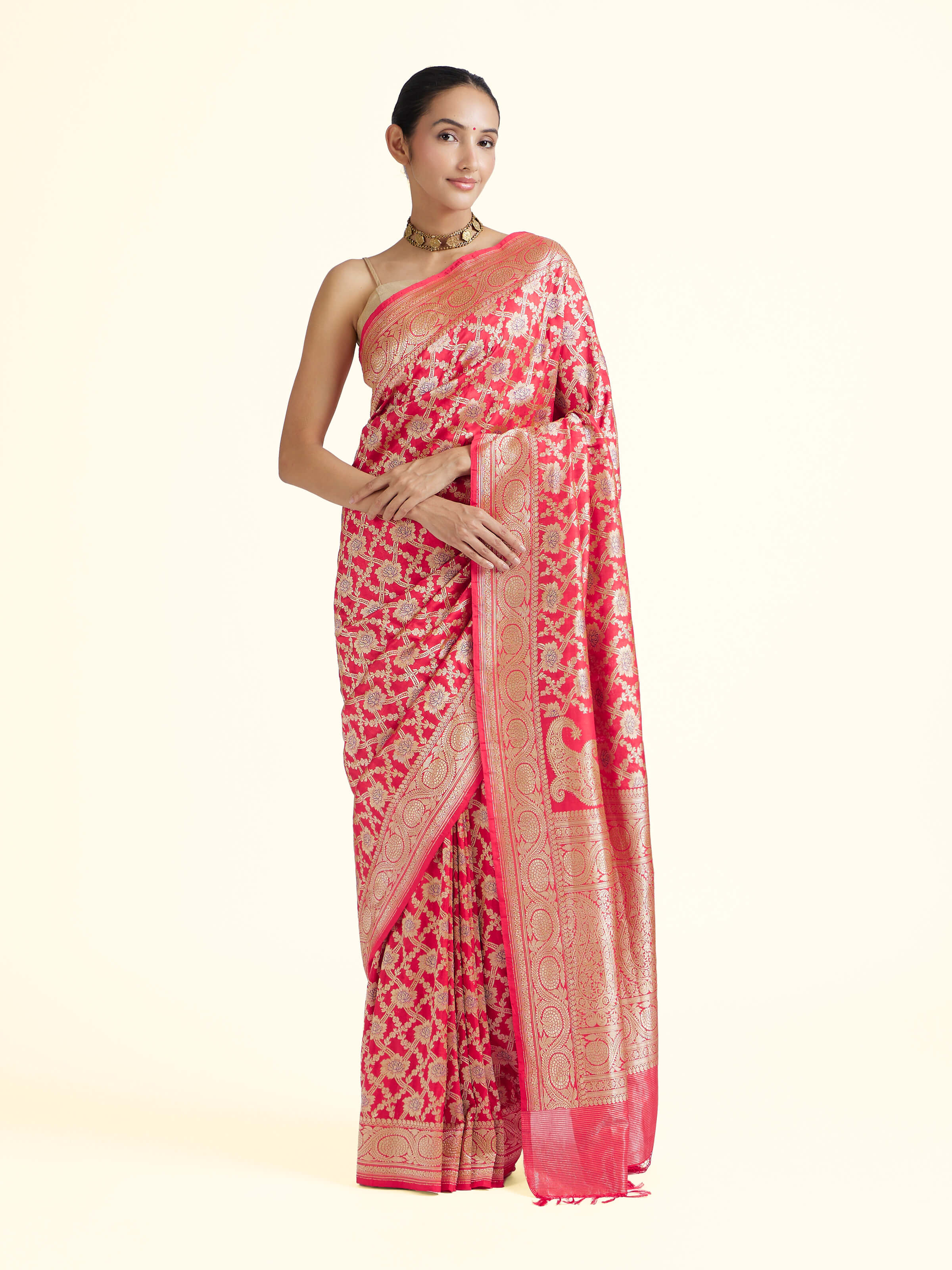 Front view of red mulberry katan silk Banarasi saree with rich woven zari motifs