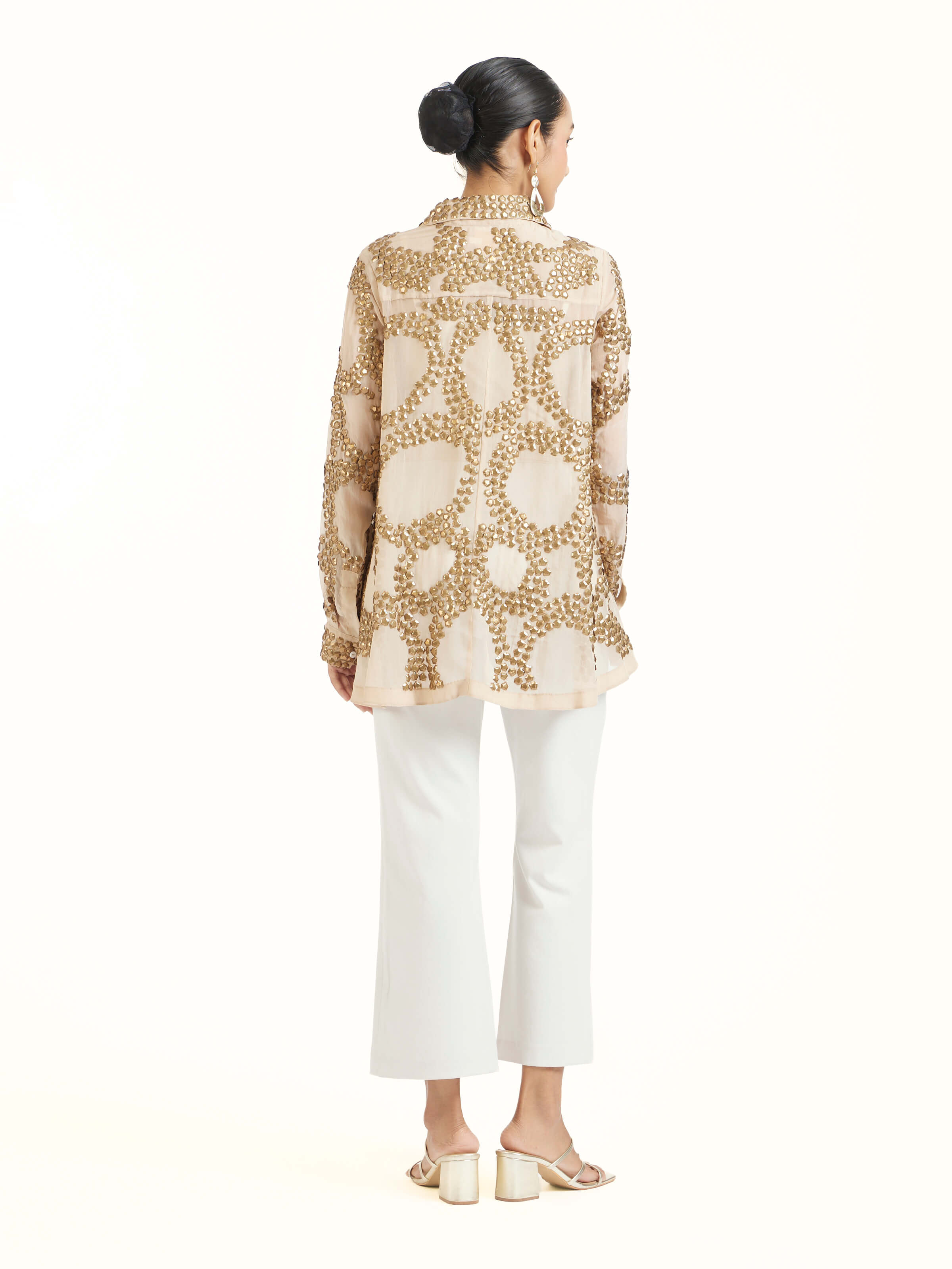 Back view of beige hand embroidered organza gold shirt displaying refined finish