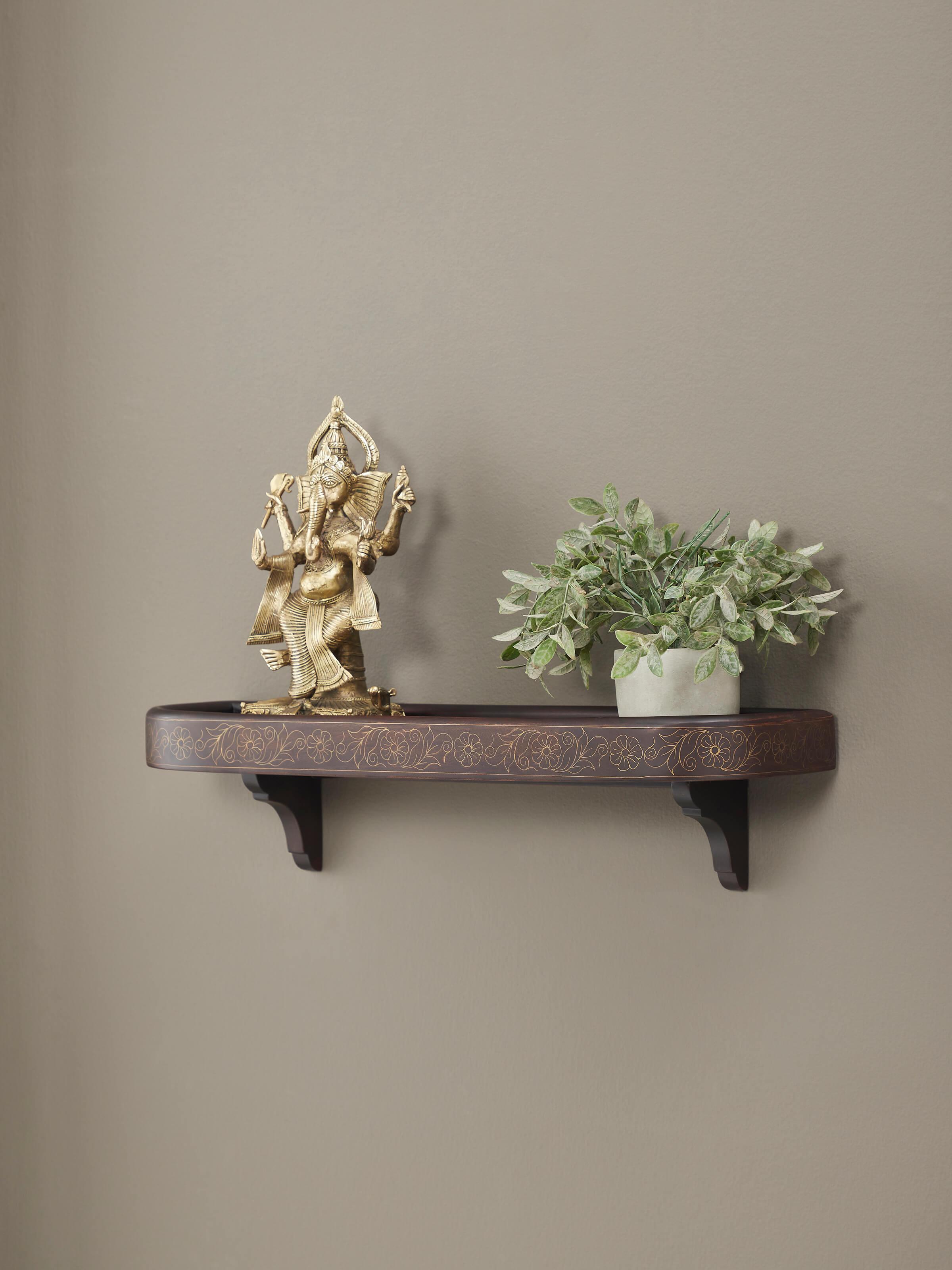 Side view of Sheesham Wood & Brass Tarkashi Wall Shelf, emphasizing its round edges and intricate brass detailing