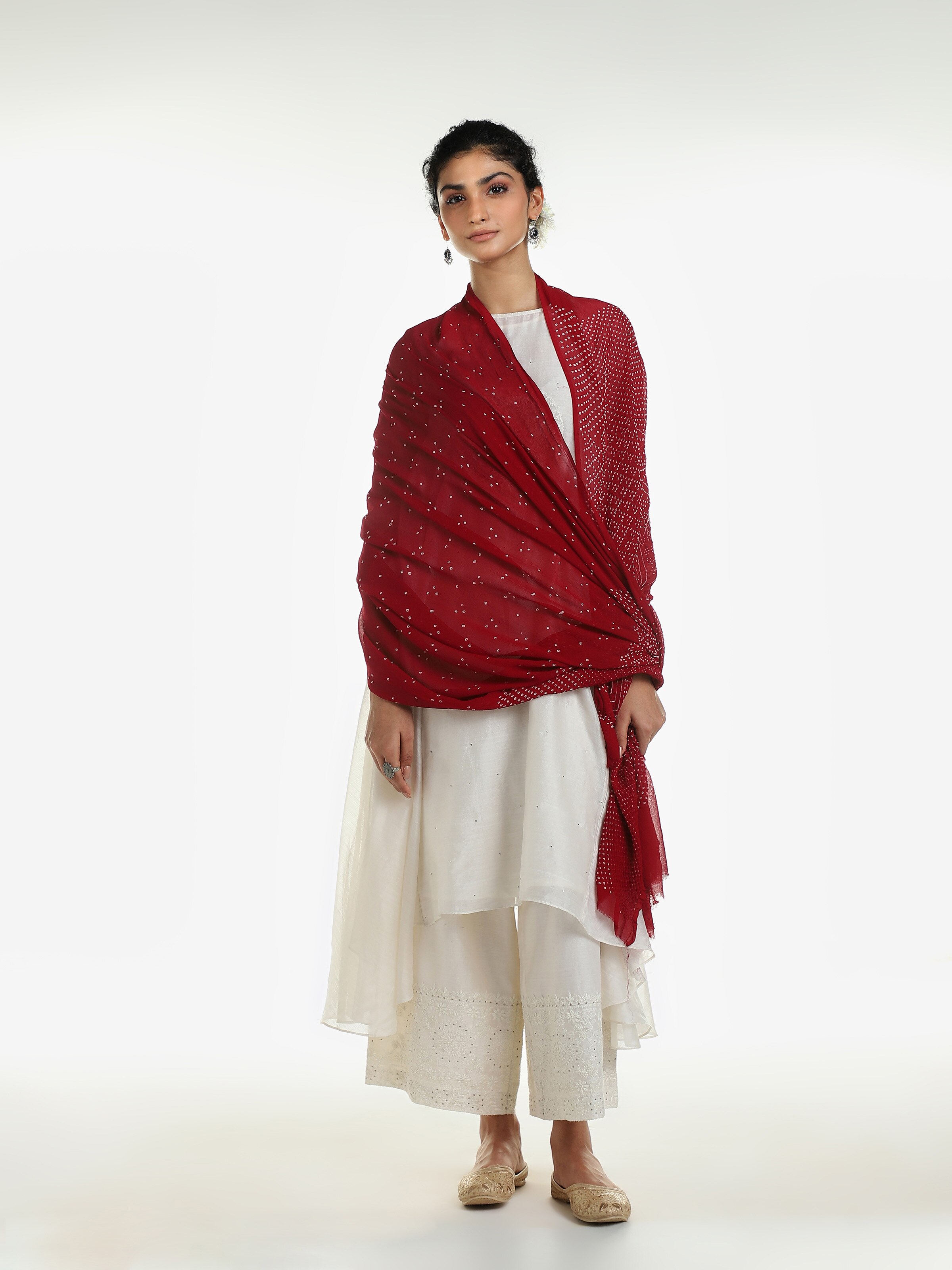 Side view of red georgette Bandhani tie and dye dupatta showing flowing drape