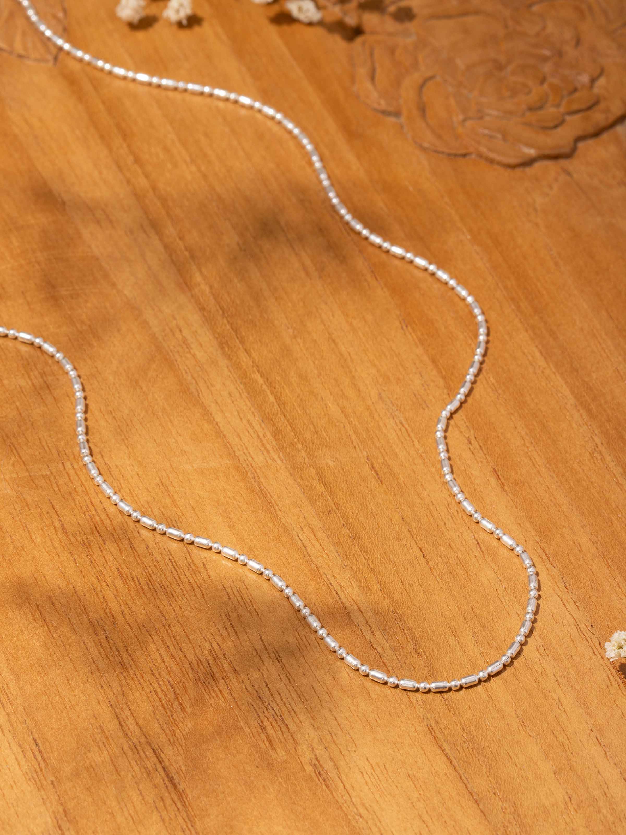 Angled image capturing the texture and shine of the chain