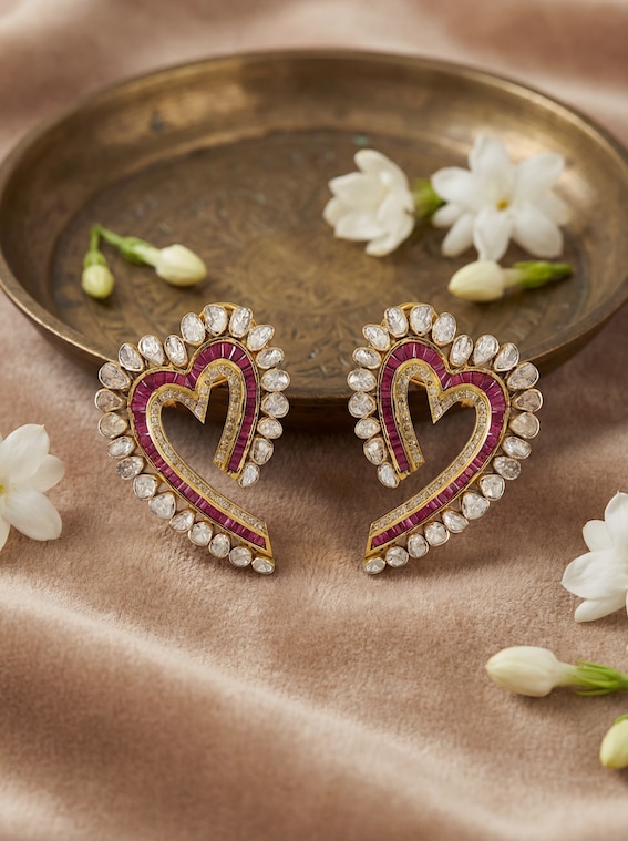 Dank Polki 14 karat gold studs worn on ears – Swadesh