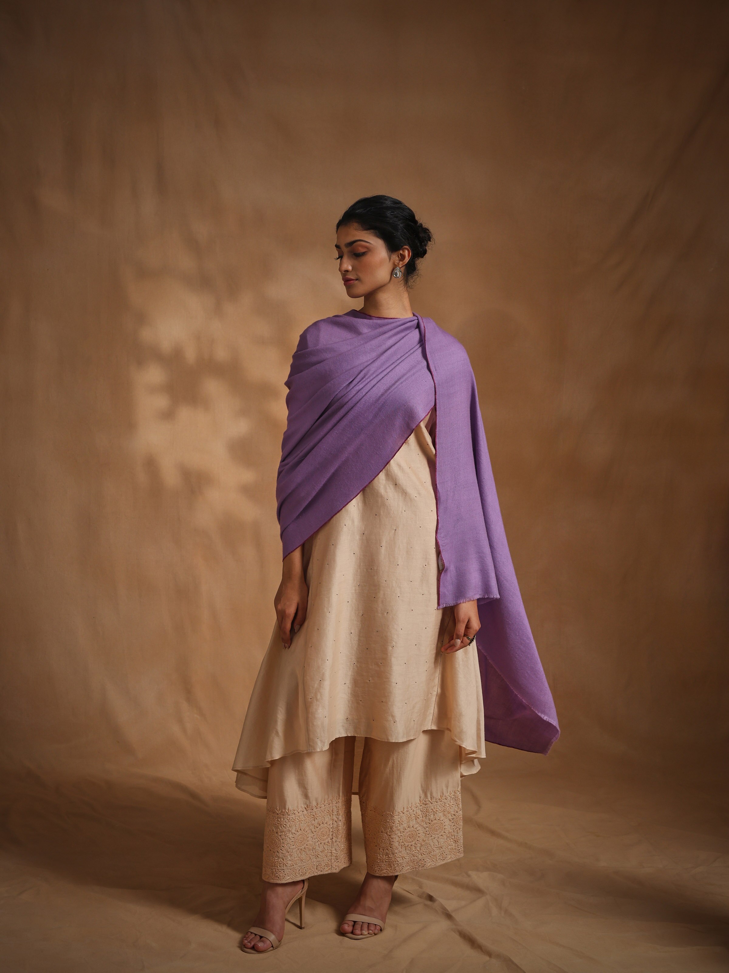 Side view of purple cashmere kaaj embroidered handwoven stole highlighting soft texture