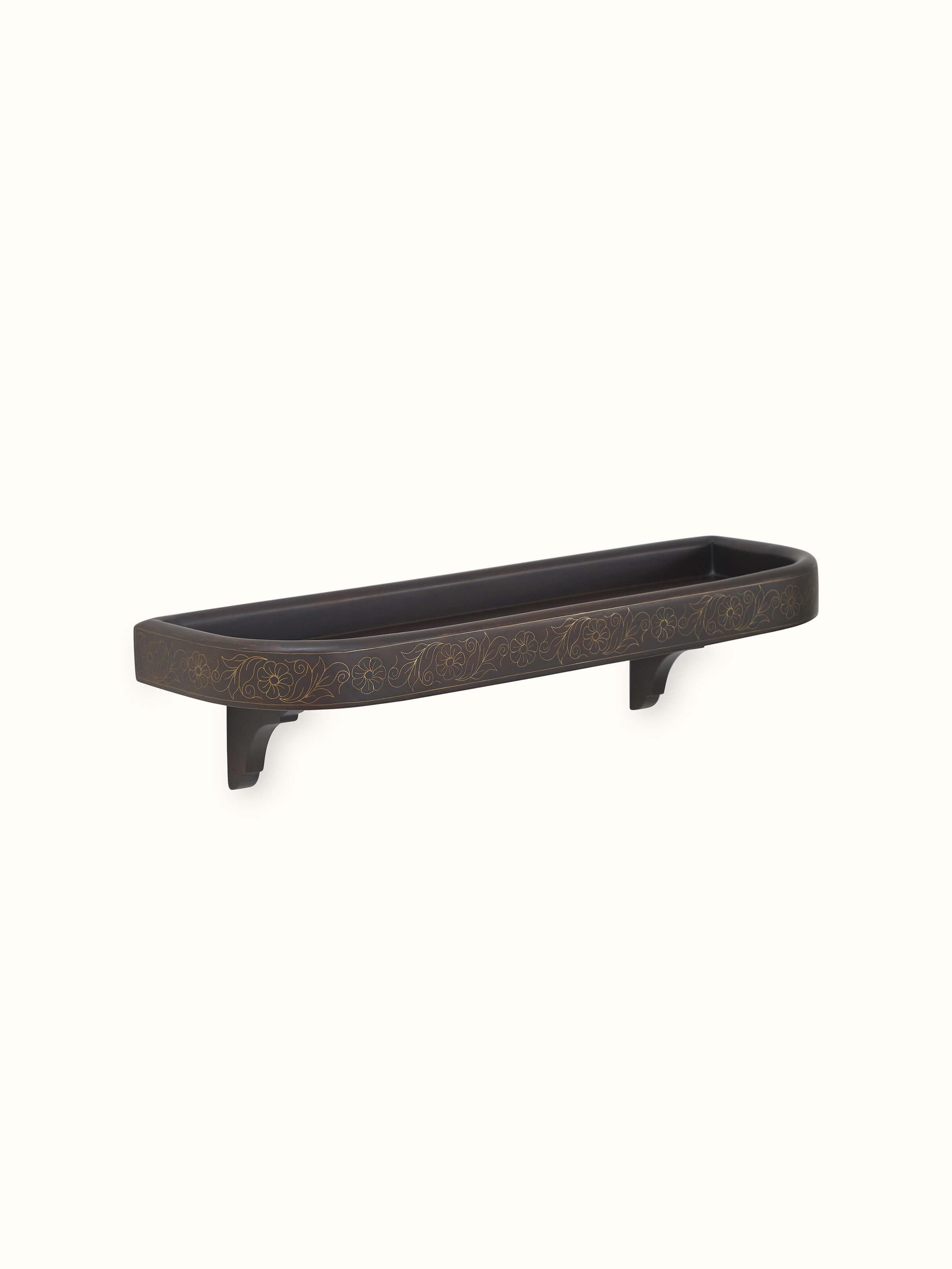 Angle view of Sheesham Wood & Brass Tarkashi Wall Shelf, highlighting its sturdy build and fine brass accents