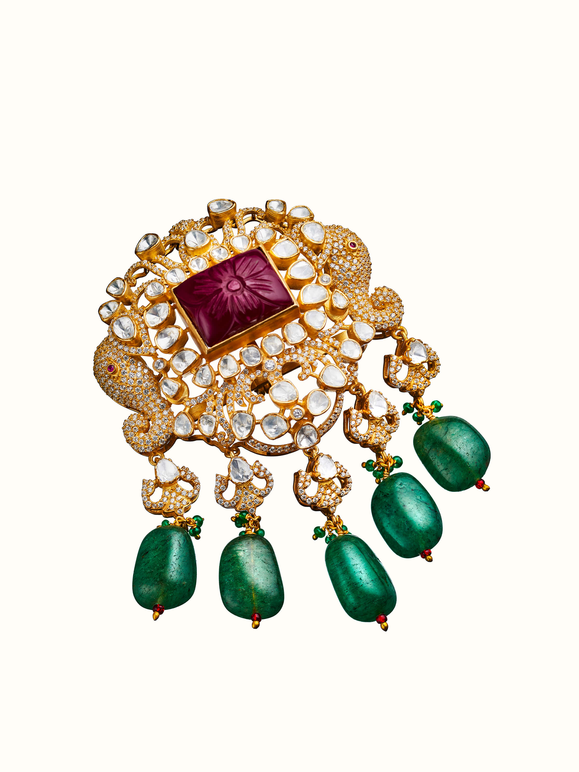 angled view of silver smithing yellow gold brooch pin