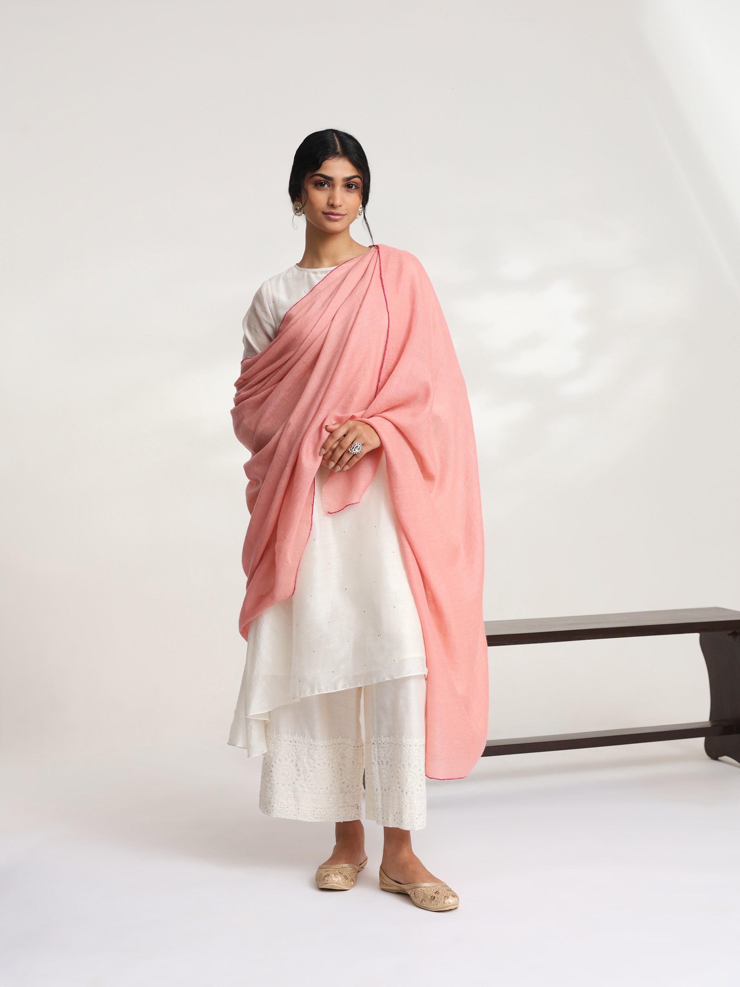 Side view of pink cashmere kaaj embroidered handwoven stole with soft drape