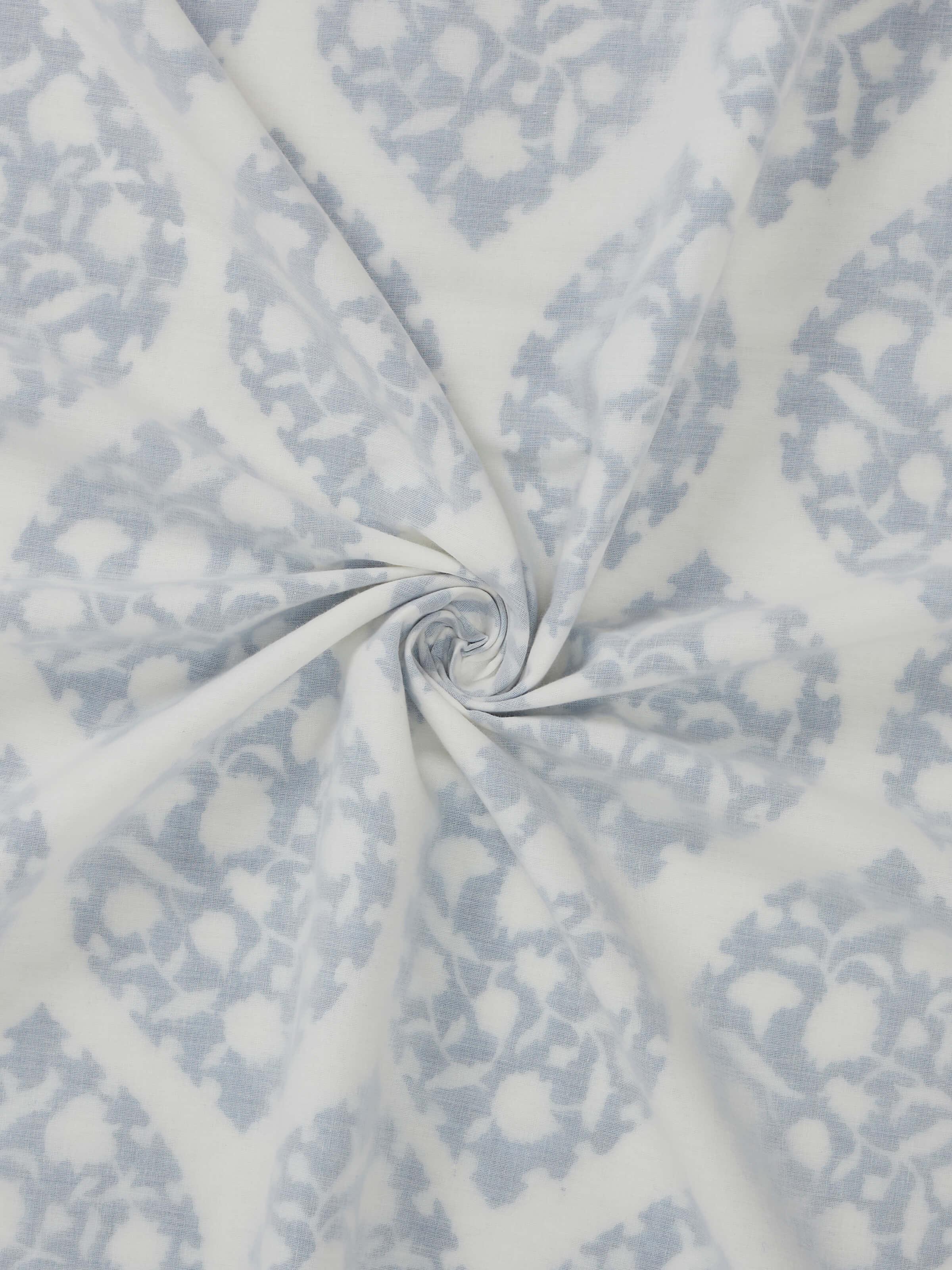 Detail shot of ogee block print on cotton fabric with crisp hand-printed edges.