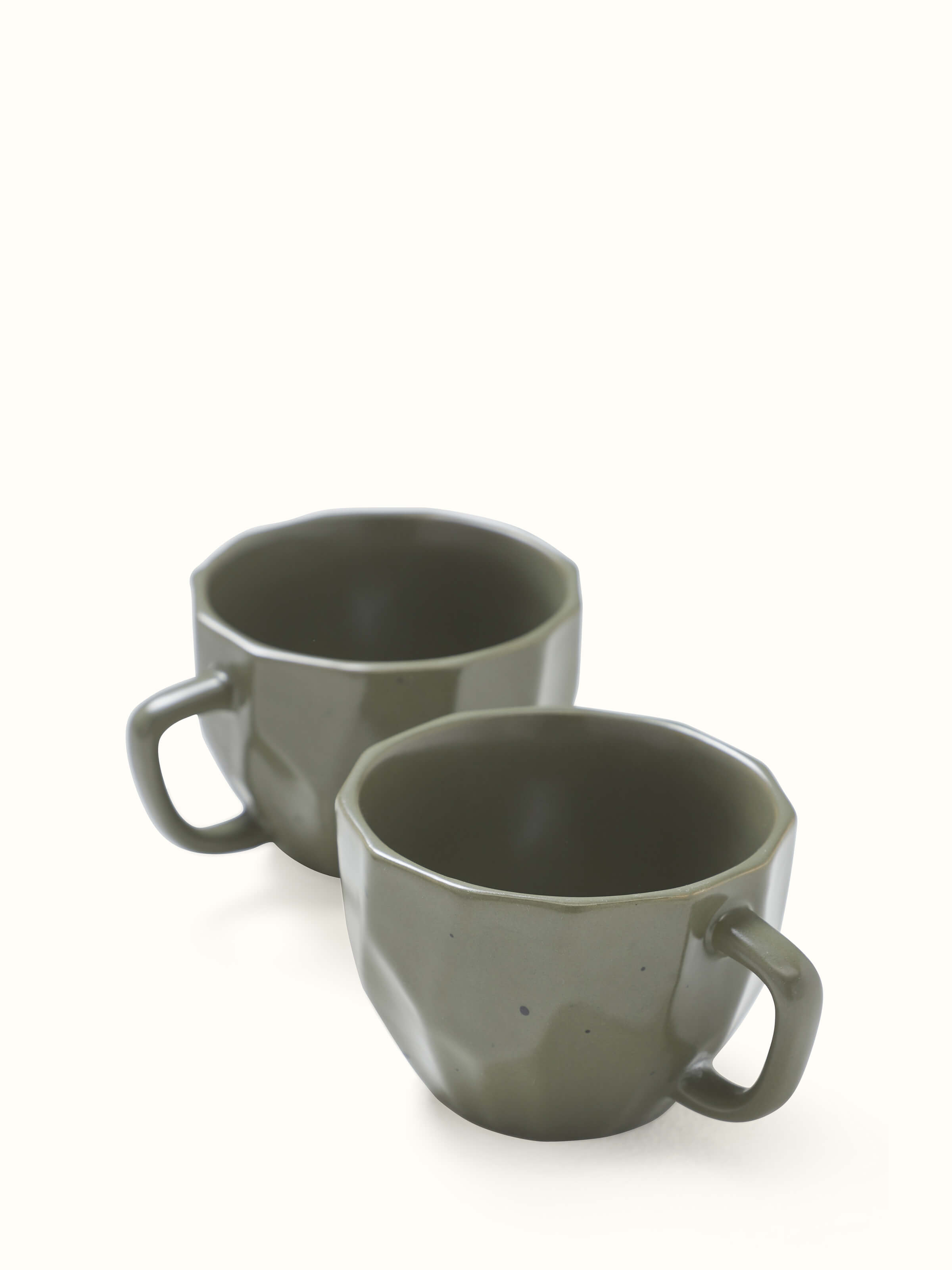 Angled view of Khurja pottery ceramic coffee mugs in green (4 pcs) showcasing the set arrangement and traditional craftsmanship