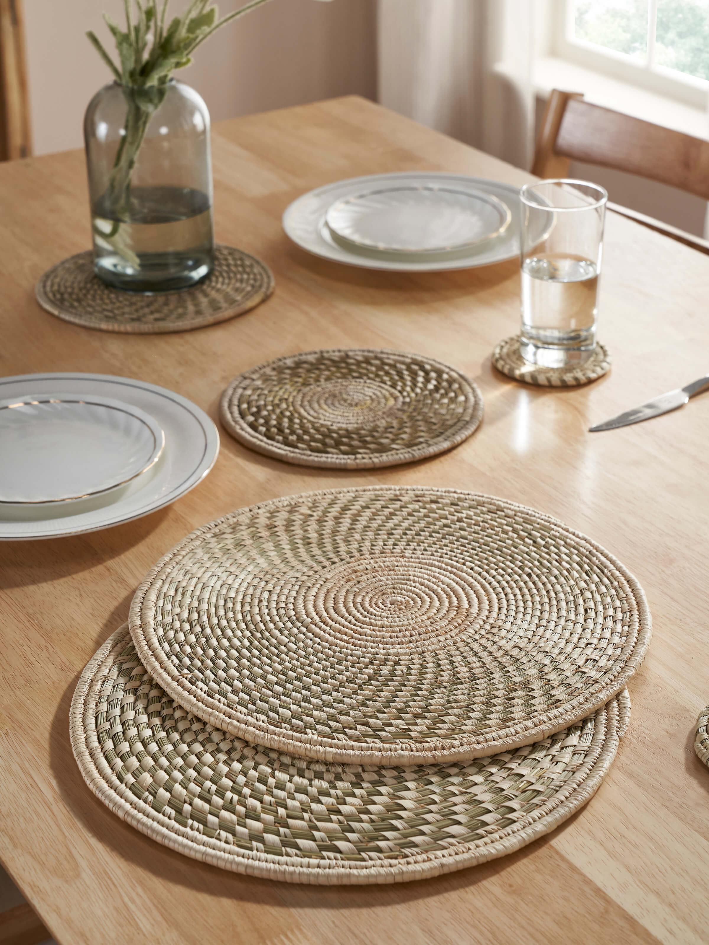 Top view showcasing the solid round shape and light green color of the table mats