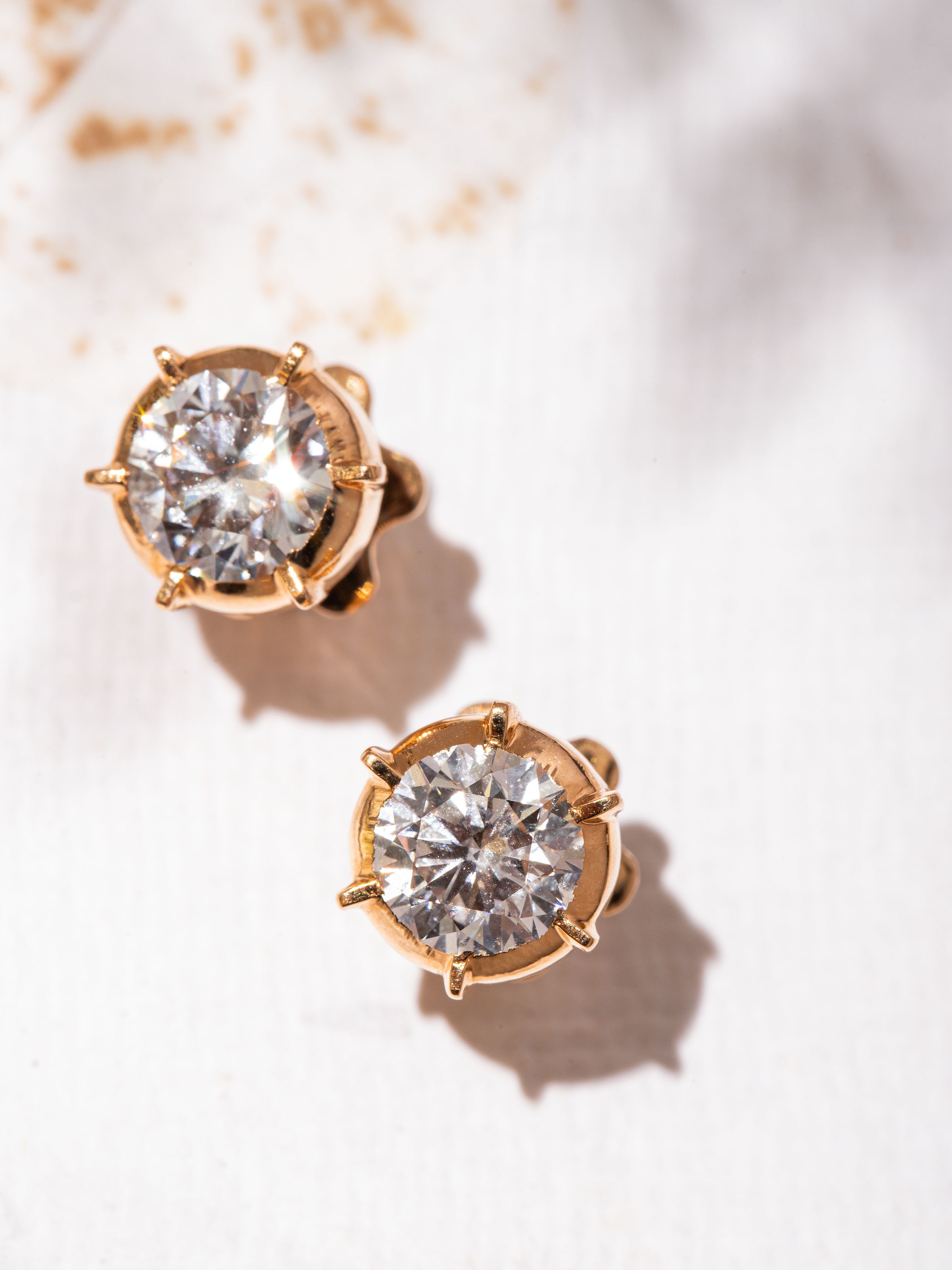 Close-up highlighting the intricate close-setting design and reflective gold surface
