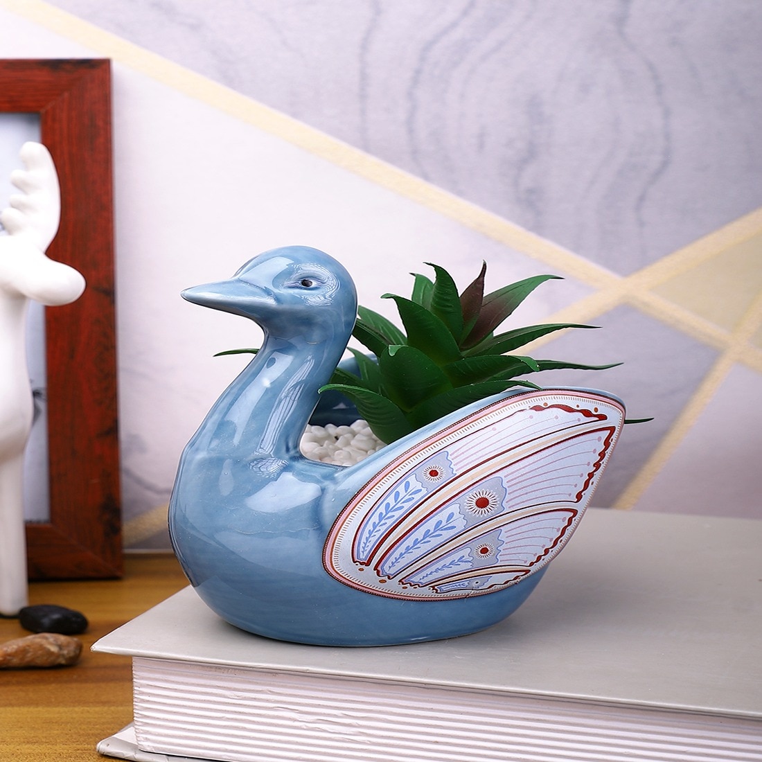 Aloe Vera Plant Inside An Artistic Blue Swan Ceramic Pot
