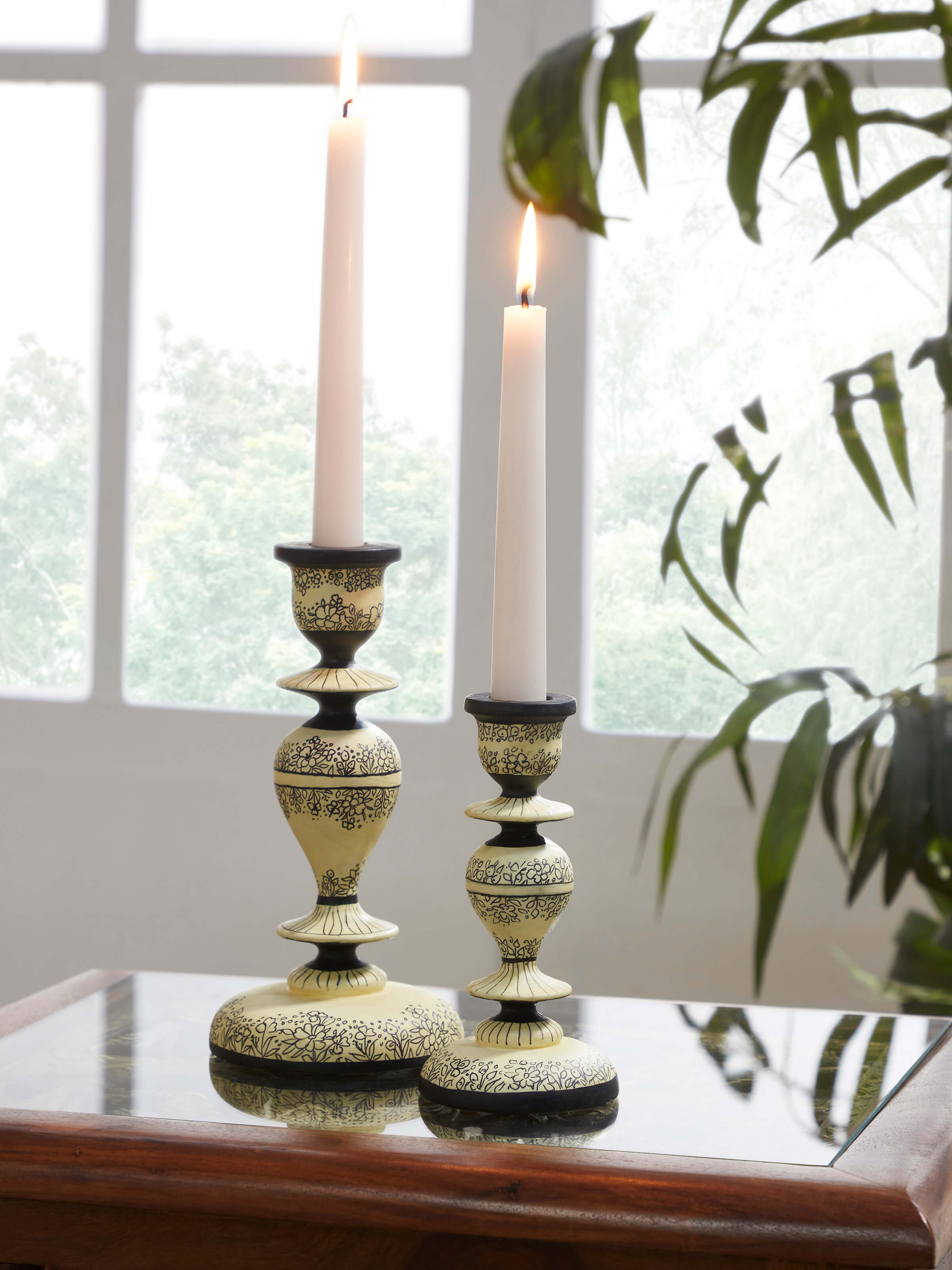 Side view of Papier-mache Candle Bases in White Color (2 Pcs) by Swadesh emphasizing their smooth texture and craftsmanship.