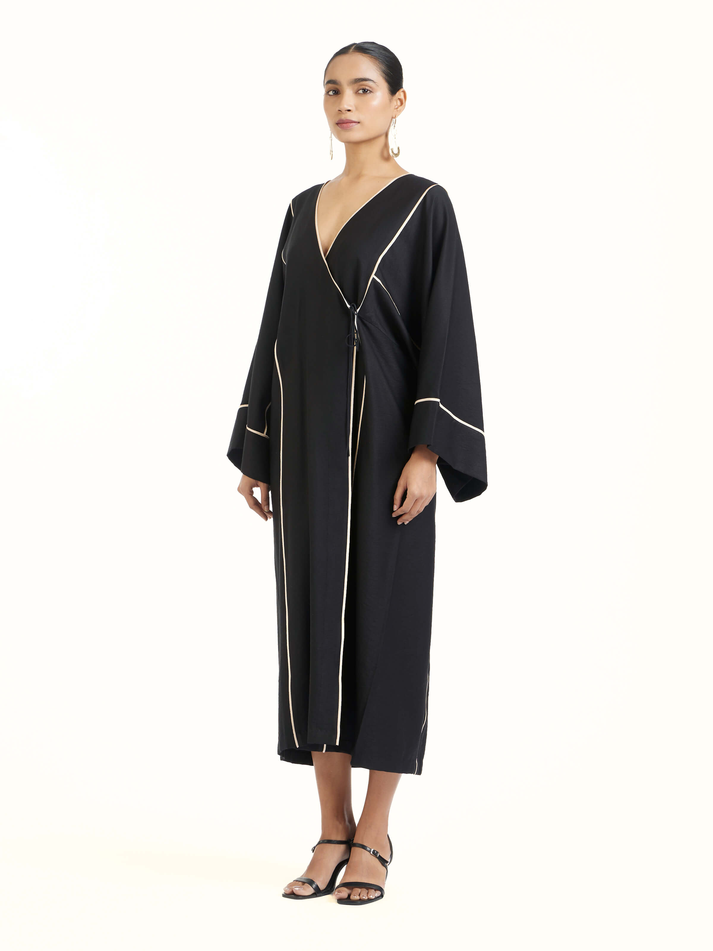 Side view of black shibori kimono dress with relaxed silhouette