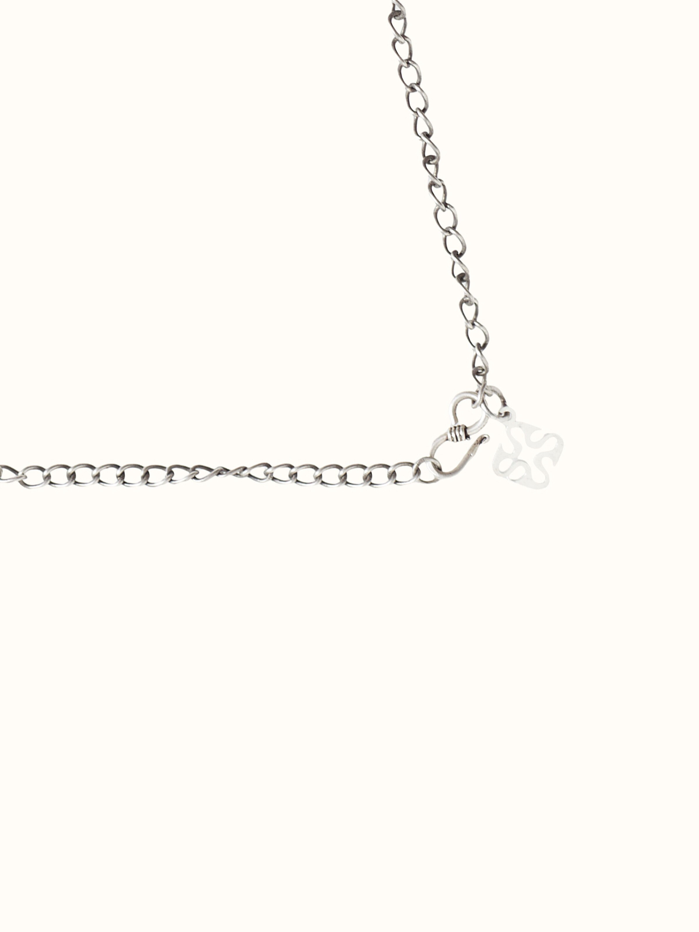 Detail of links and craftsmanship on silver smithing long necklace