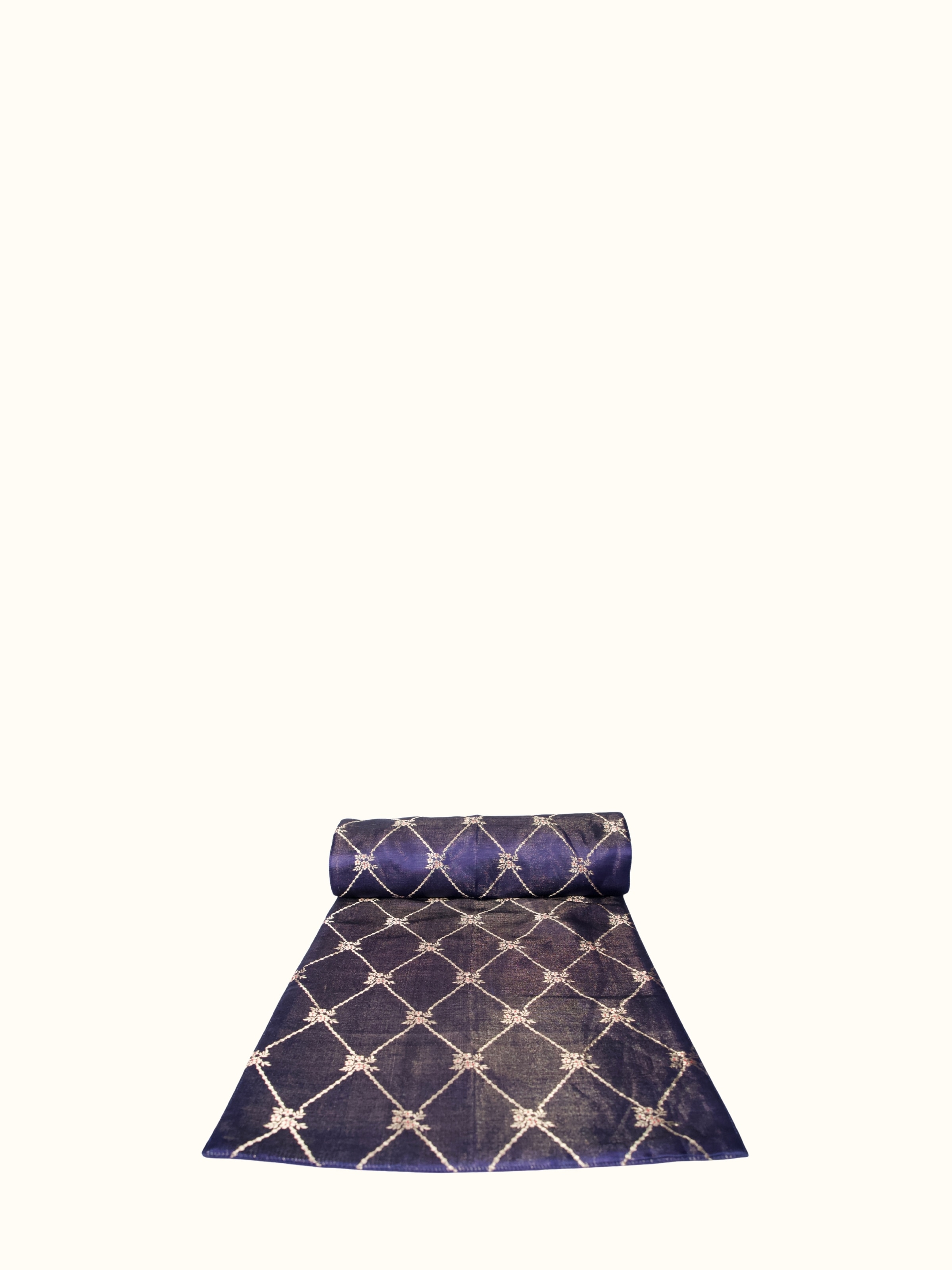 Angled view of Vanita navy blue silk handloom table runner