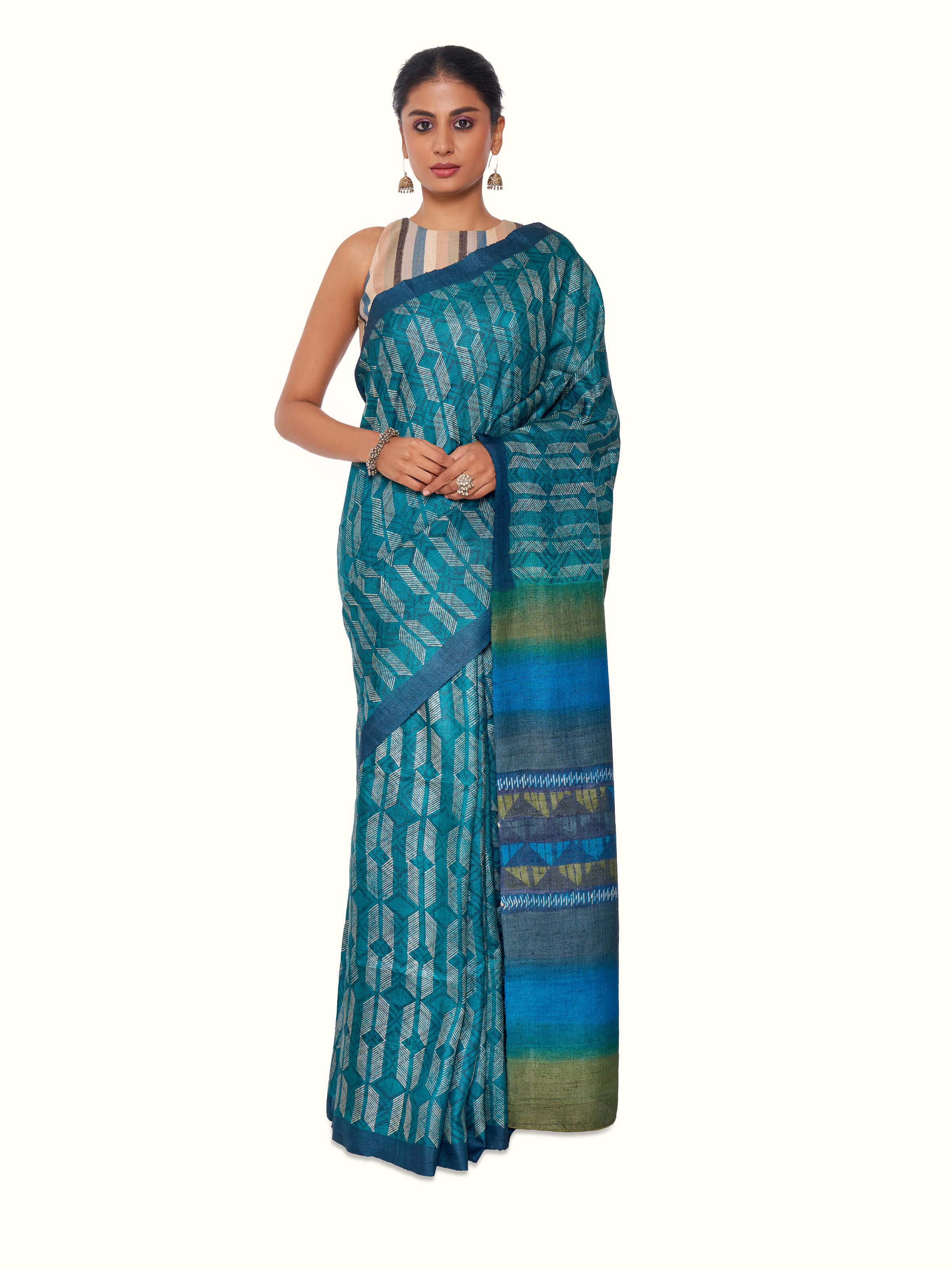 Front view of sea green tussar silk discharge block printed saree with artisanal motifs