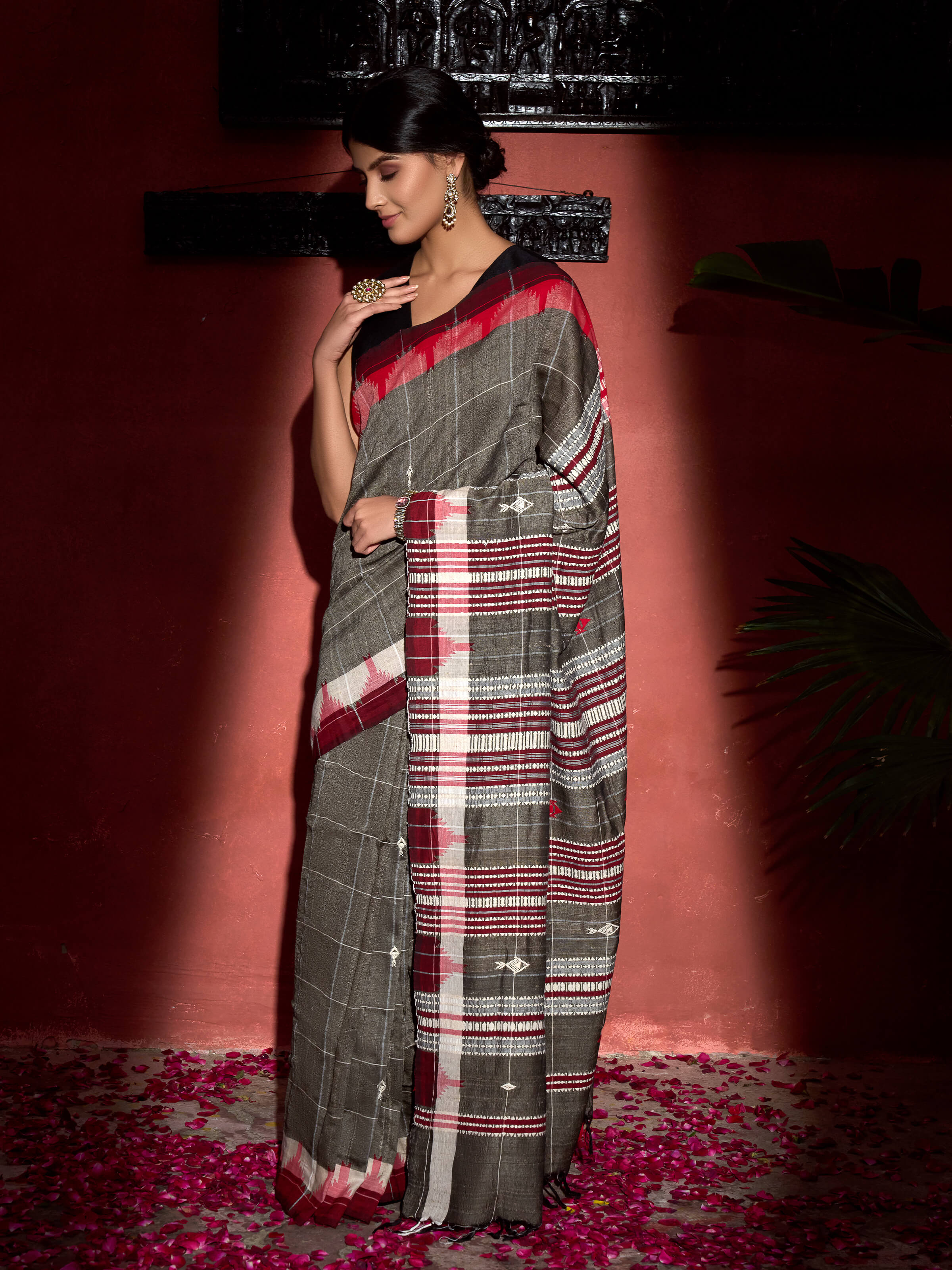 Side view of brown cotton tussar silk Kotpad saree highlighting traditional weave and drape