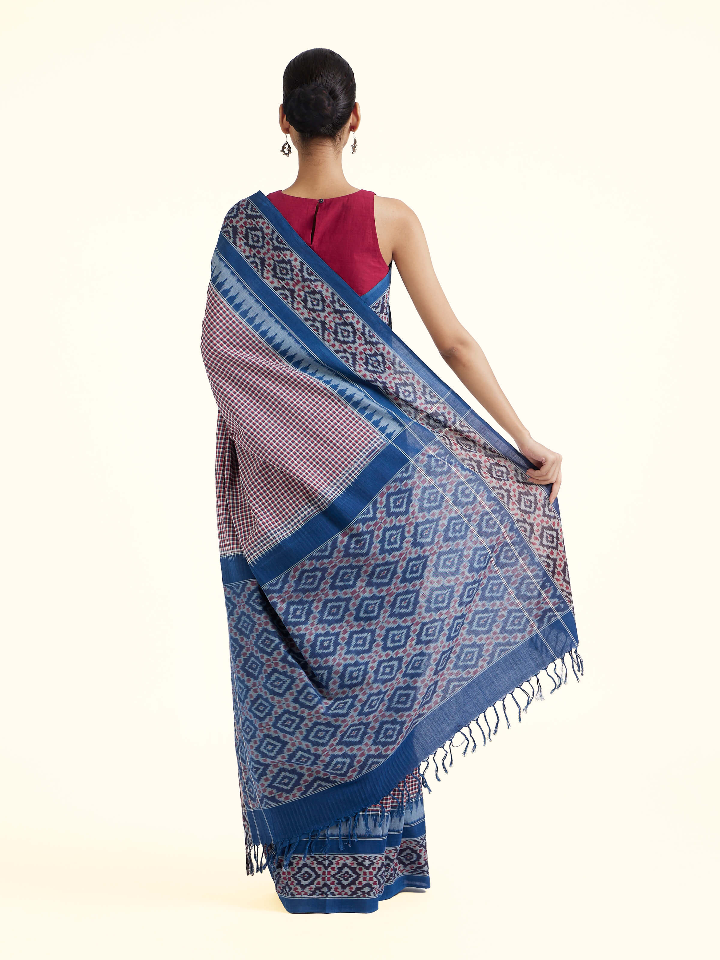 Back view of indigo natural dyed cotton ikat saree displaying overall design