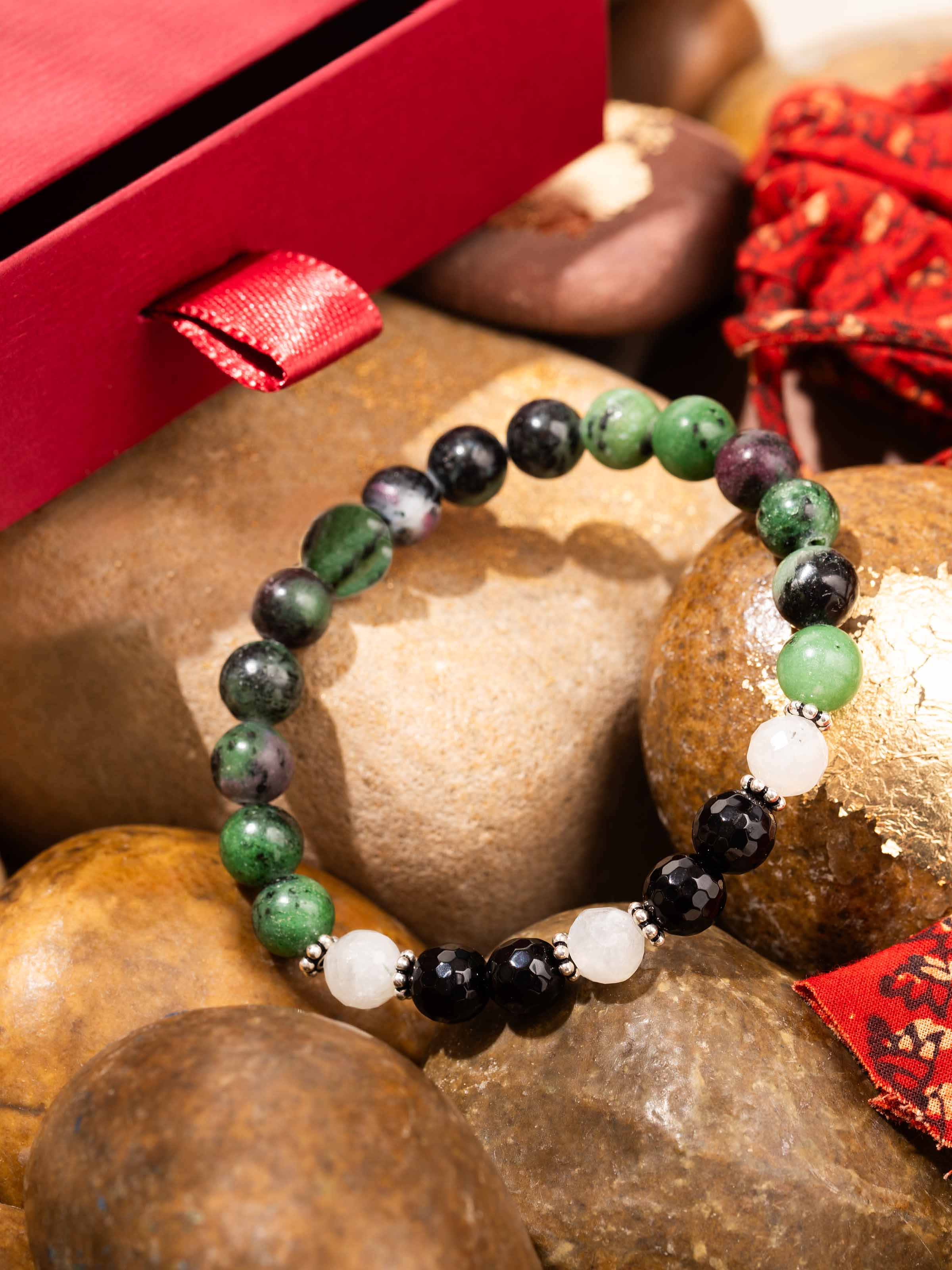 Side view of Malachite, Onyx & Moonstone Bracelet, emphasizing the natural stone textures and silver craftsmanship