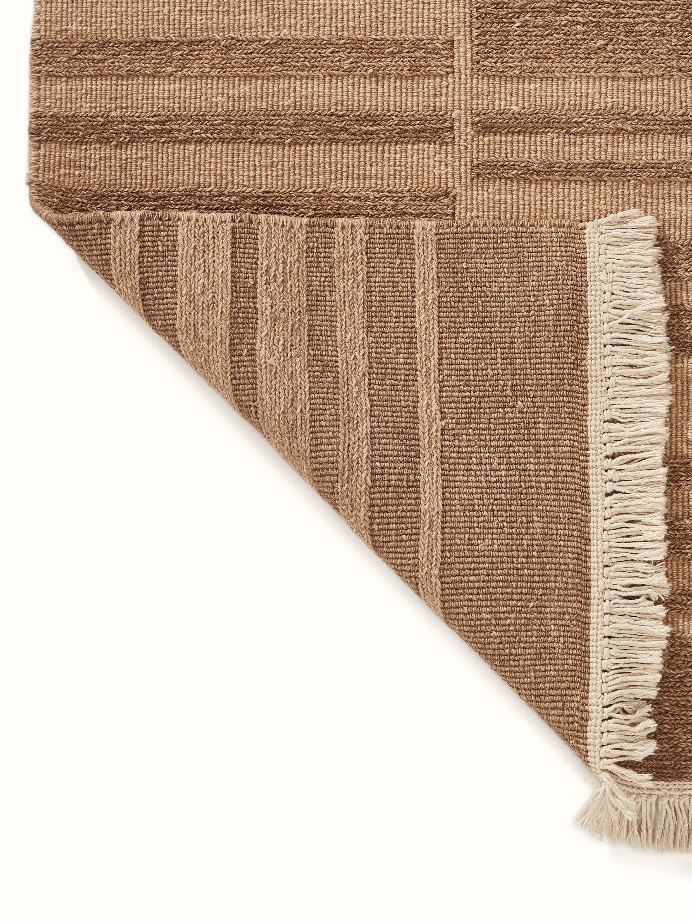 Back view illustrating the sturdy hand-knotted construction and finishing of the Bhadohi rug