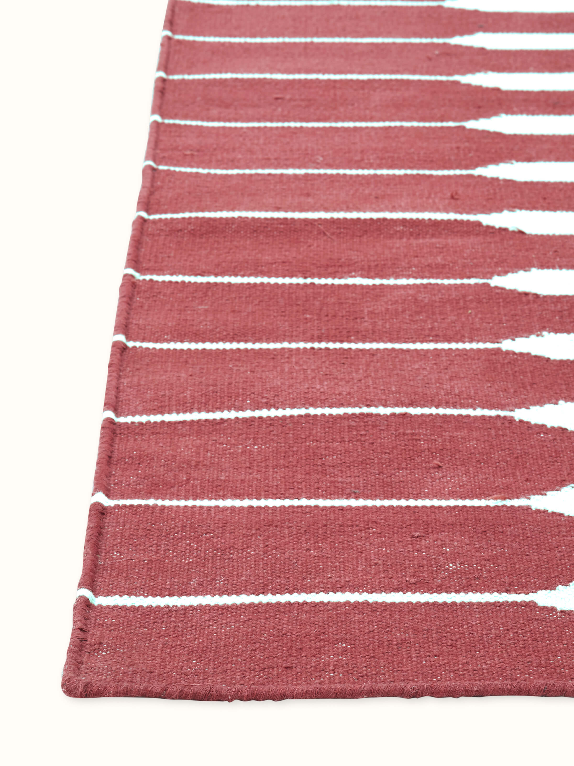 Angled shot emphasizing the cotton weave texture and vibrant color contrast