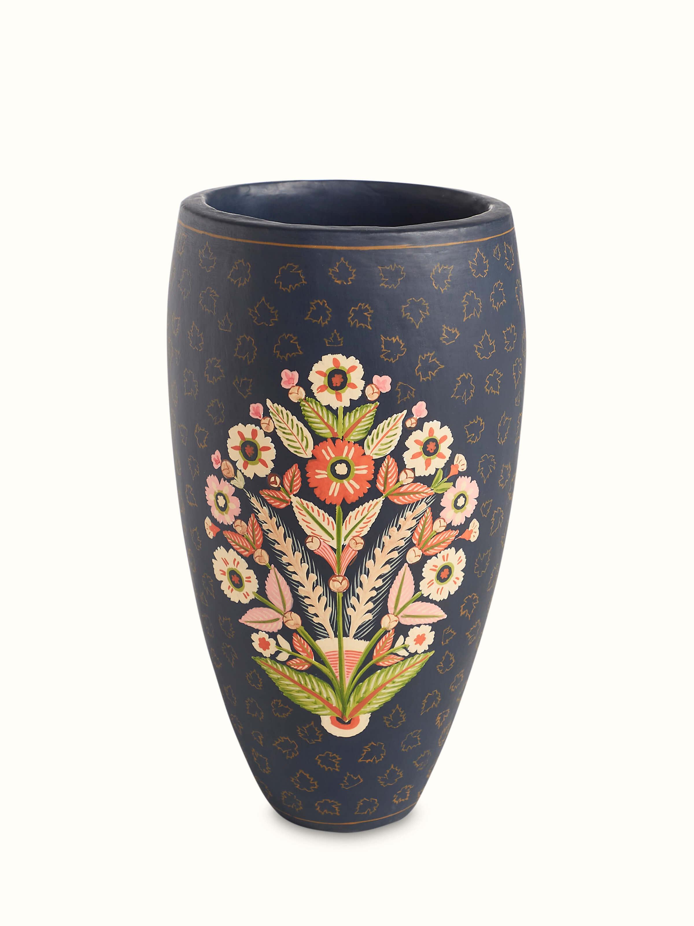 Front view of Papier-mache chinar table vase with intricate design