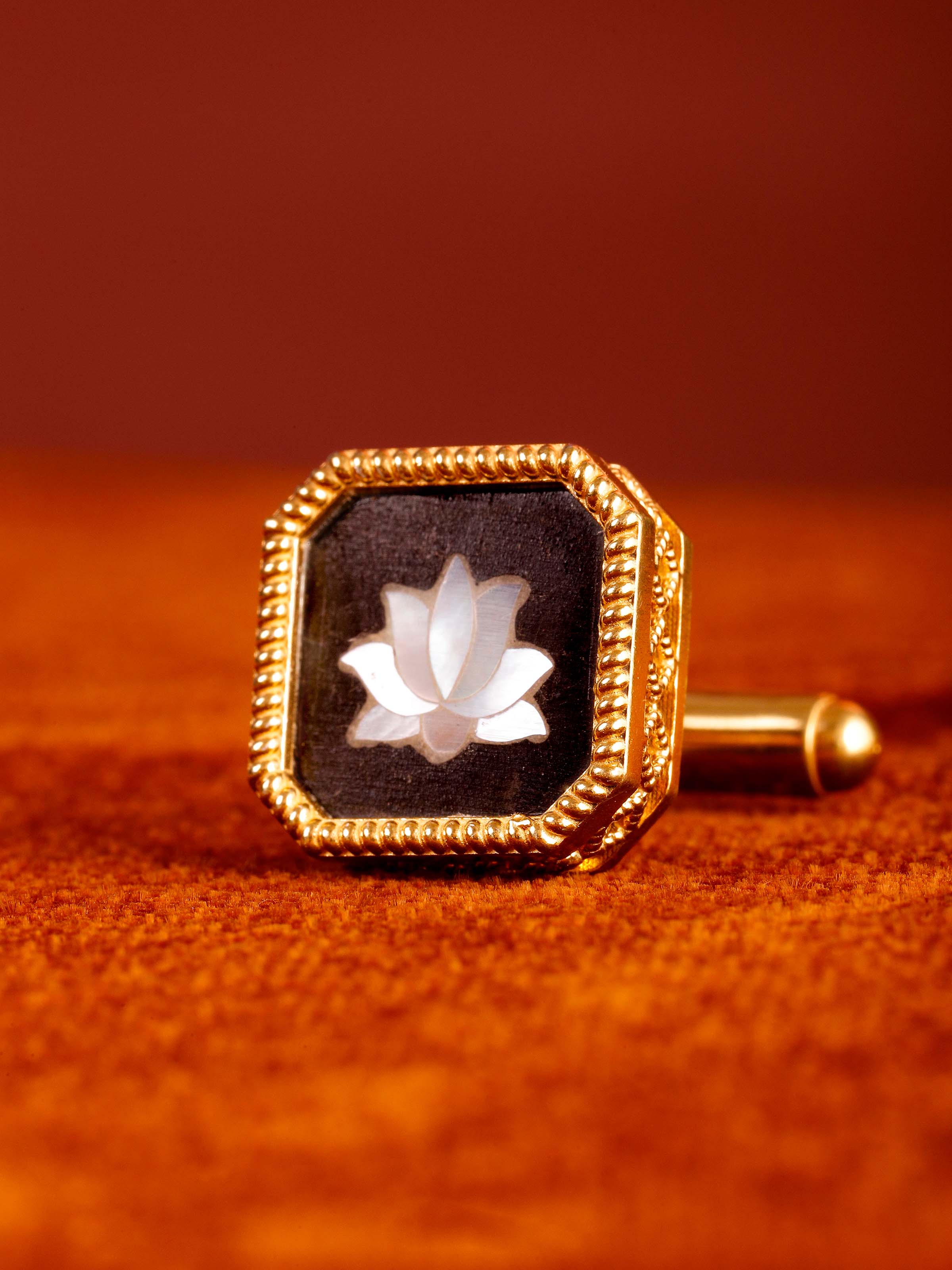 Detail shot of parchinkari silver cufflinks