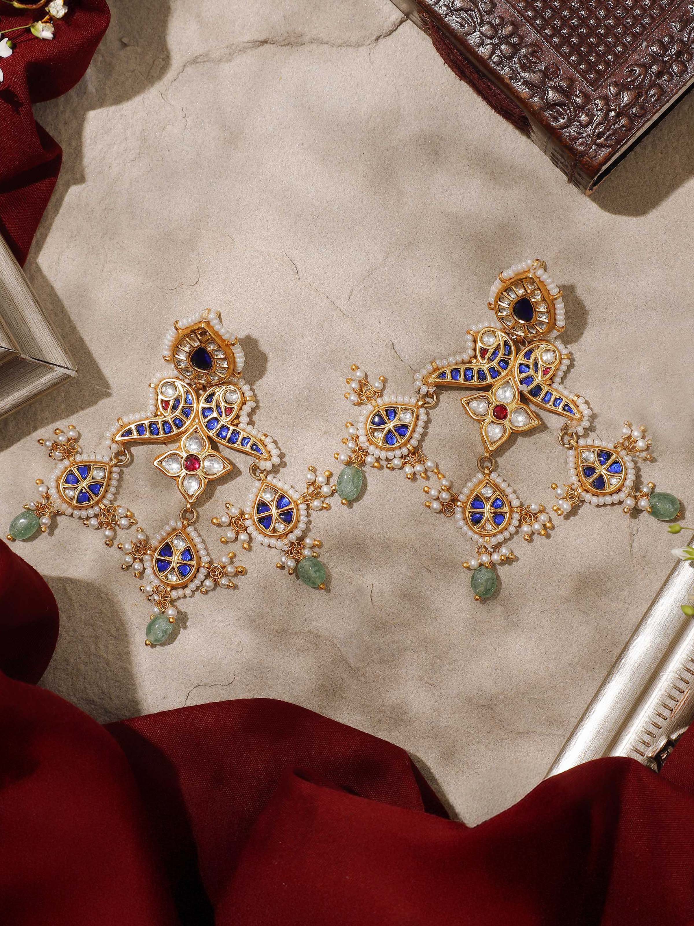 Lifestyle shot showing silver drops earrings worn with casual ethnic look