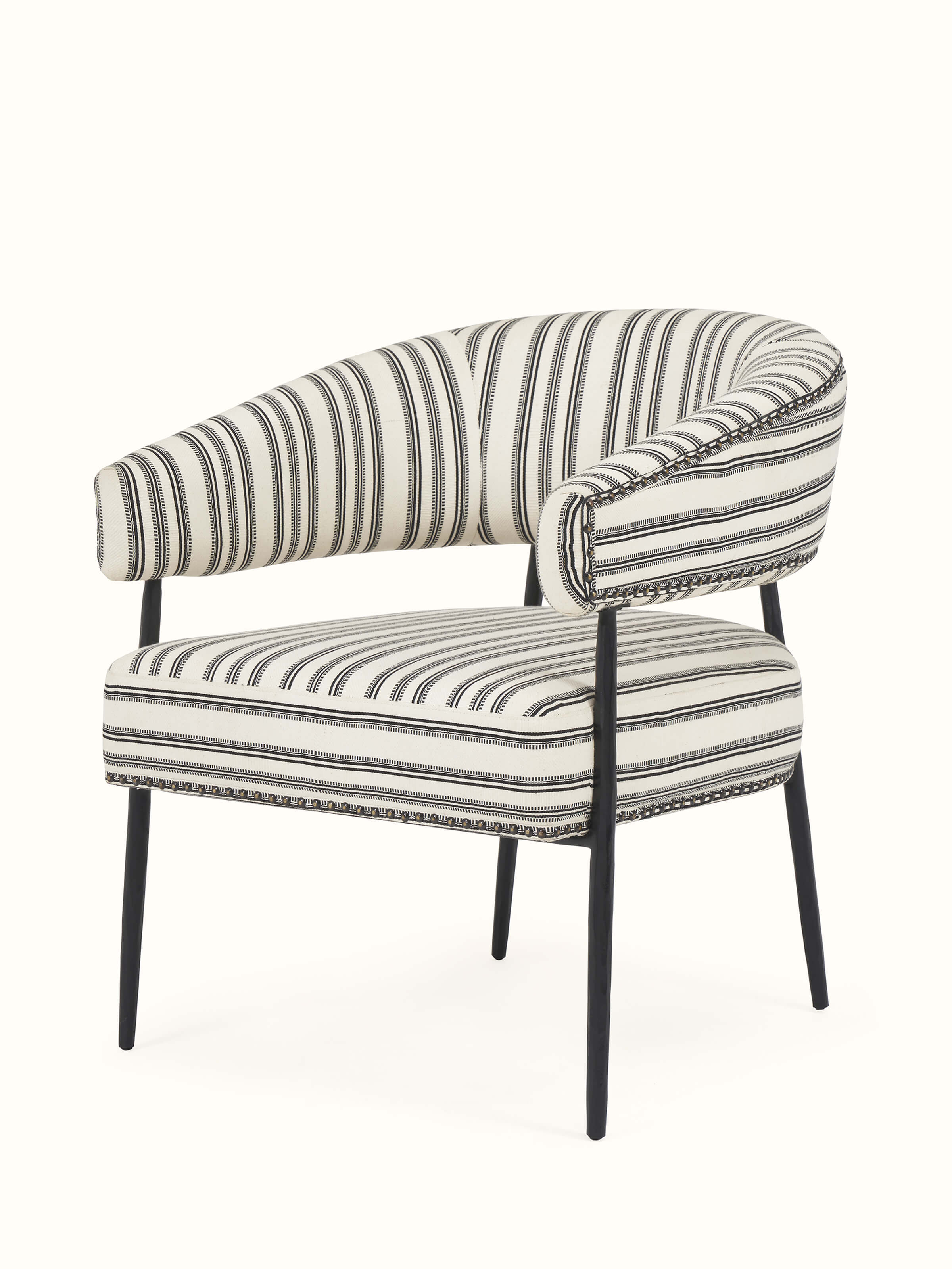 Close-up view of upholstered metal armchair showing the rich fabric texture and sturdy metal structure.