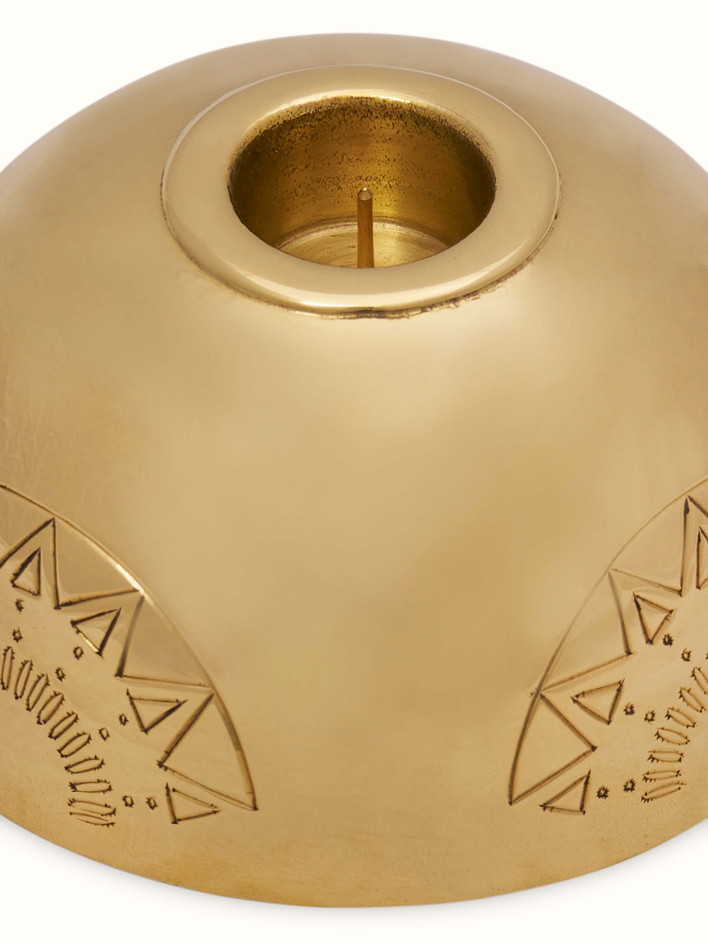 Angled view of Brass Candle Stand Green Color, showing the classic design and color contrast