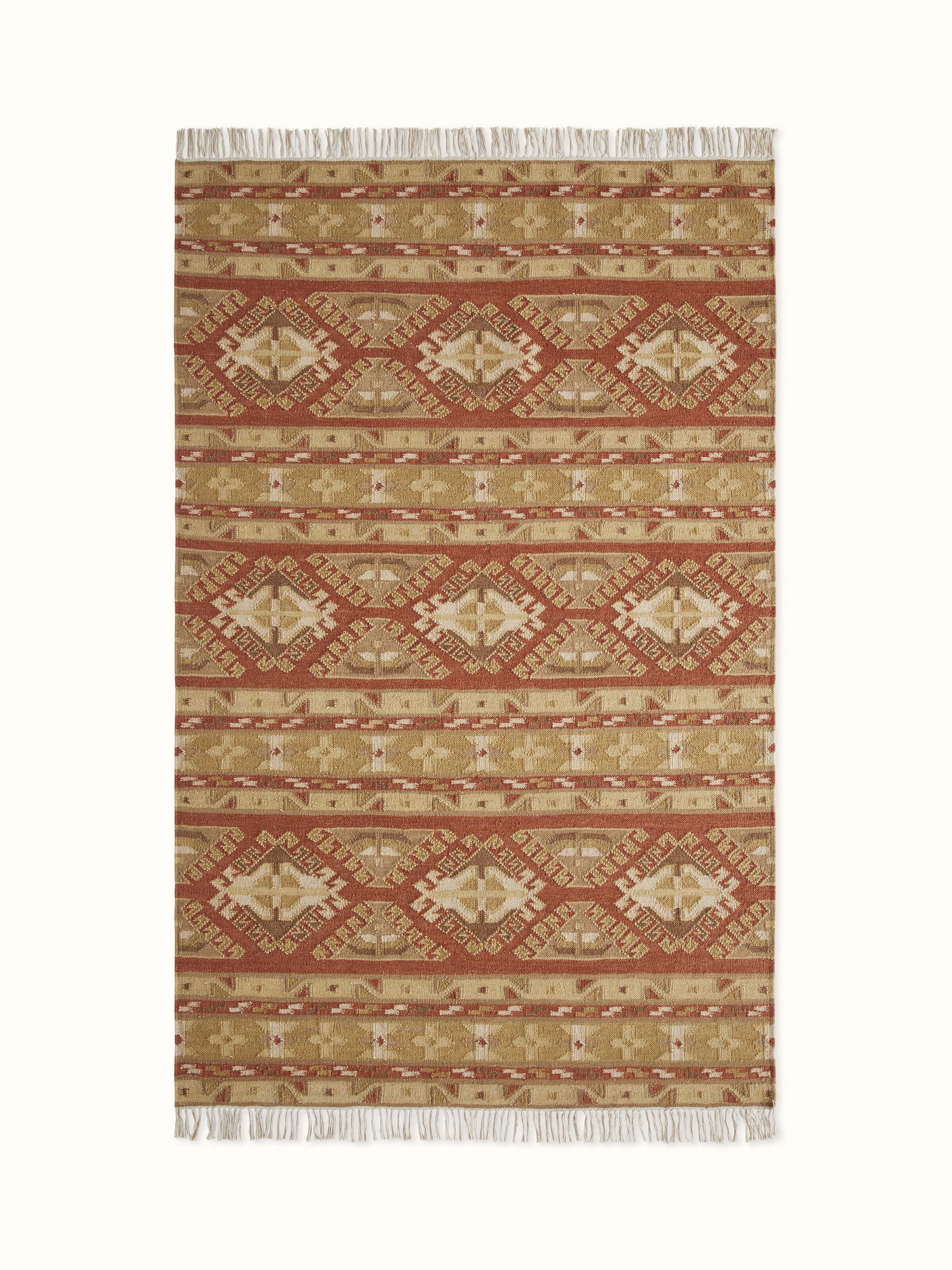Front view showcasing the beige and rust geometric kilim pattern on wool Panja dhurrie