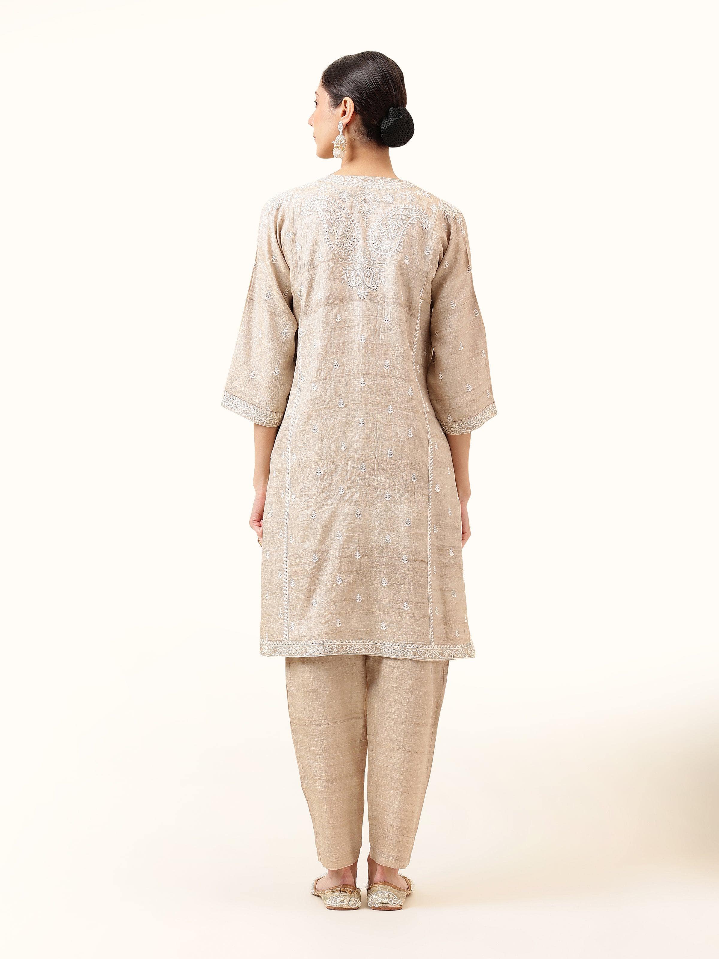 Back view displaying the clean silhouette and comfort-first tailoring.