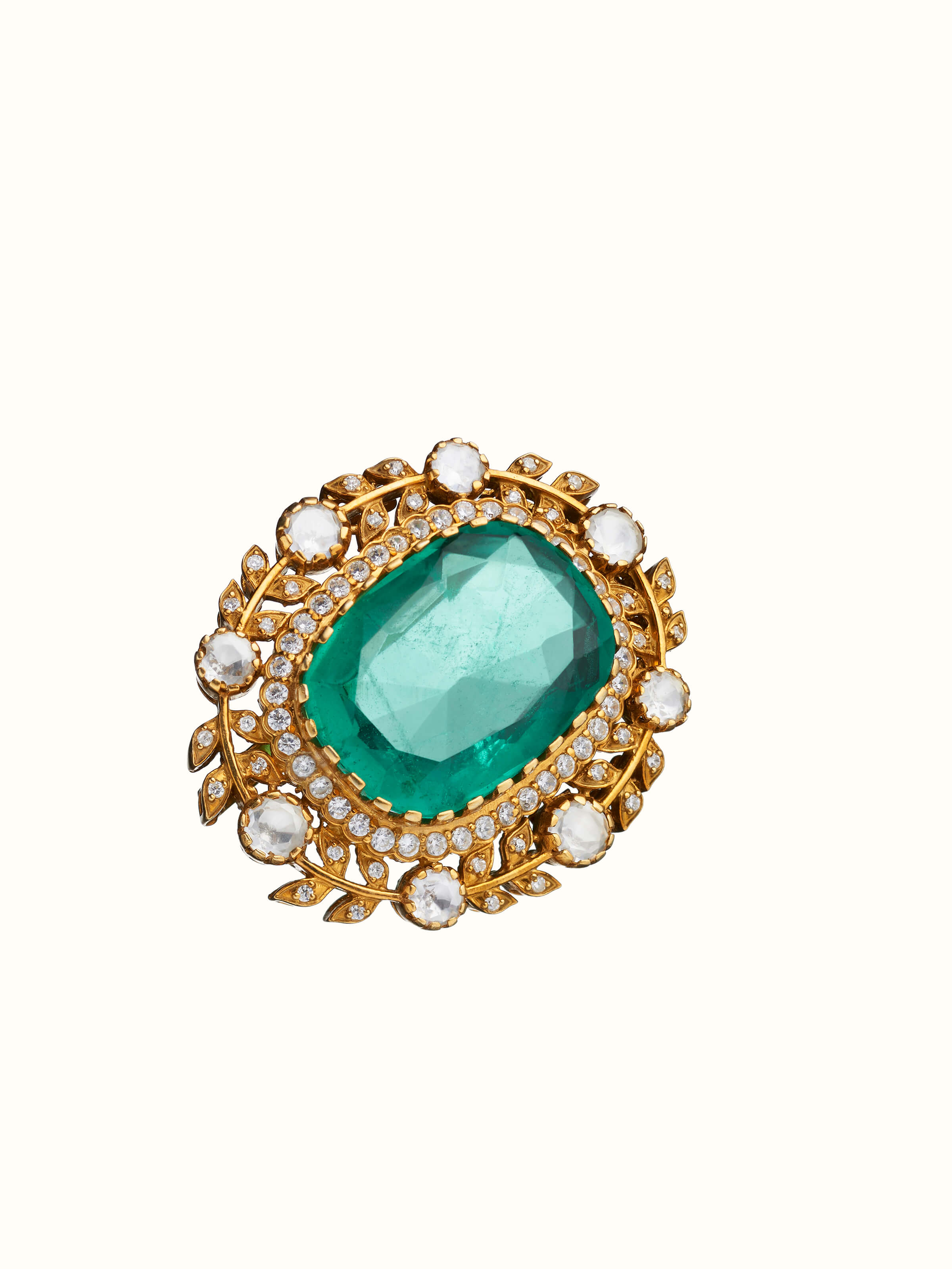 angled view of silver smithing yellow gold brooch pin