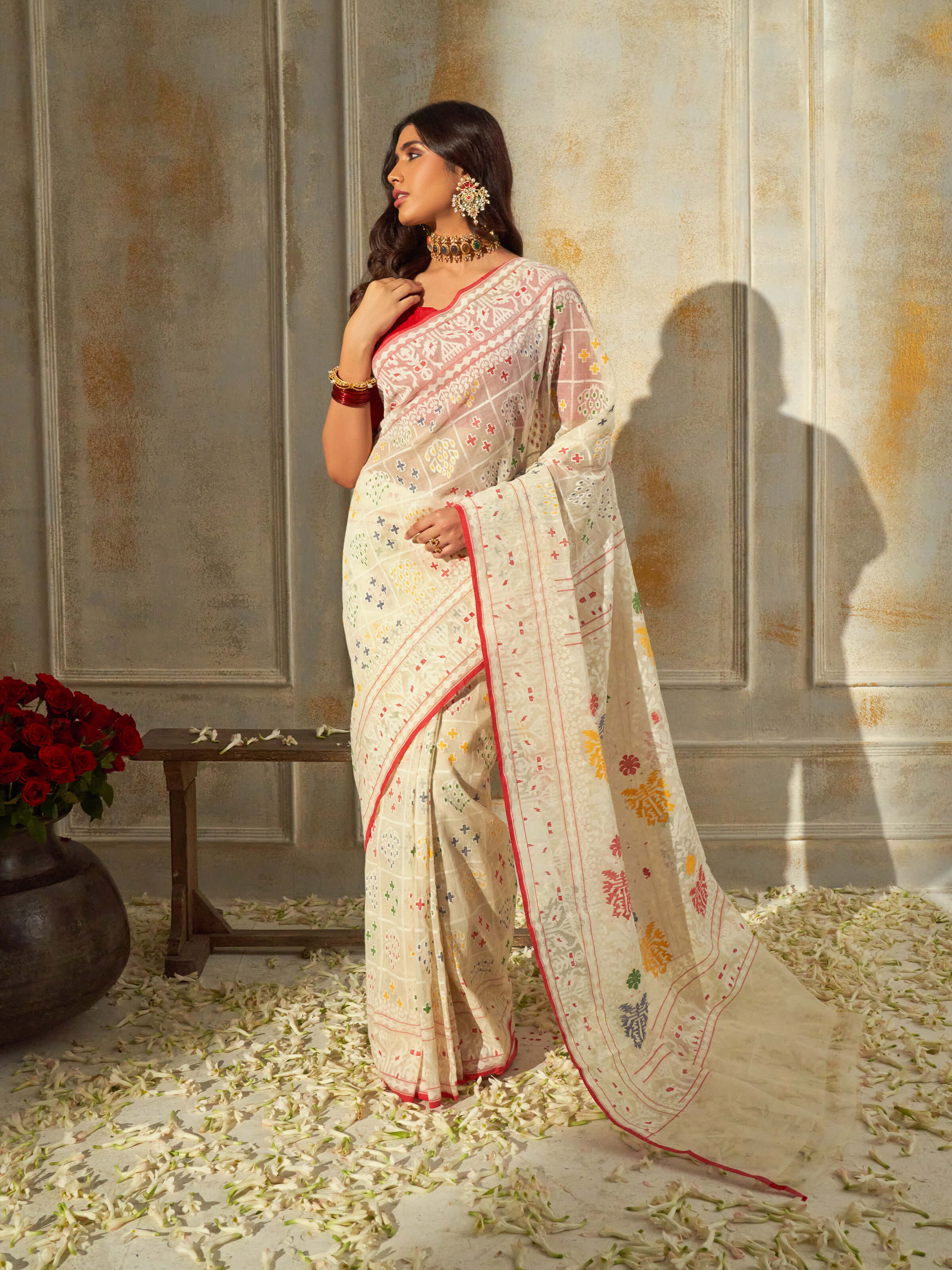 Side view of white cotton Awadh Jamdani saree with elegant drape and subtle border