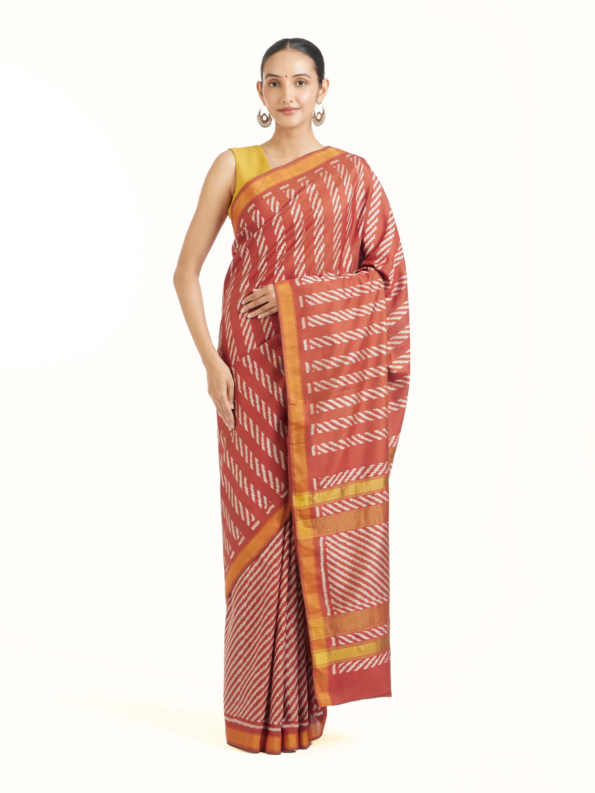 Front view of pink mulberry silk Patola saree with geometric woven motifs