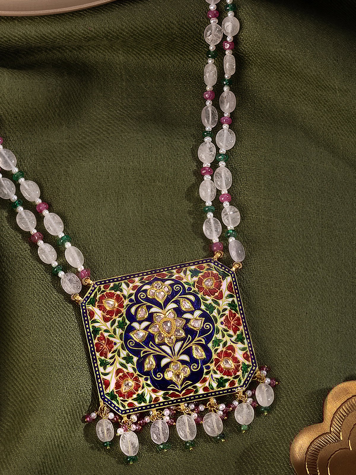 Lifestyle view of Jaipur Meenakari pendant and chain paired with festive attire, reflecting Rajasthani heritage.