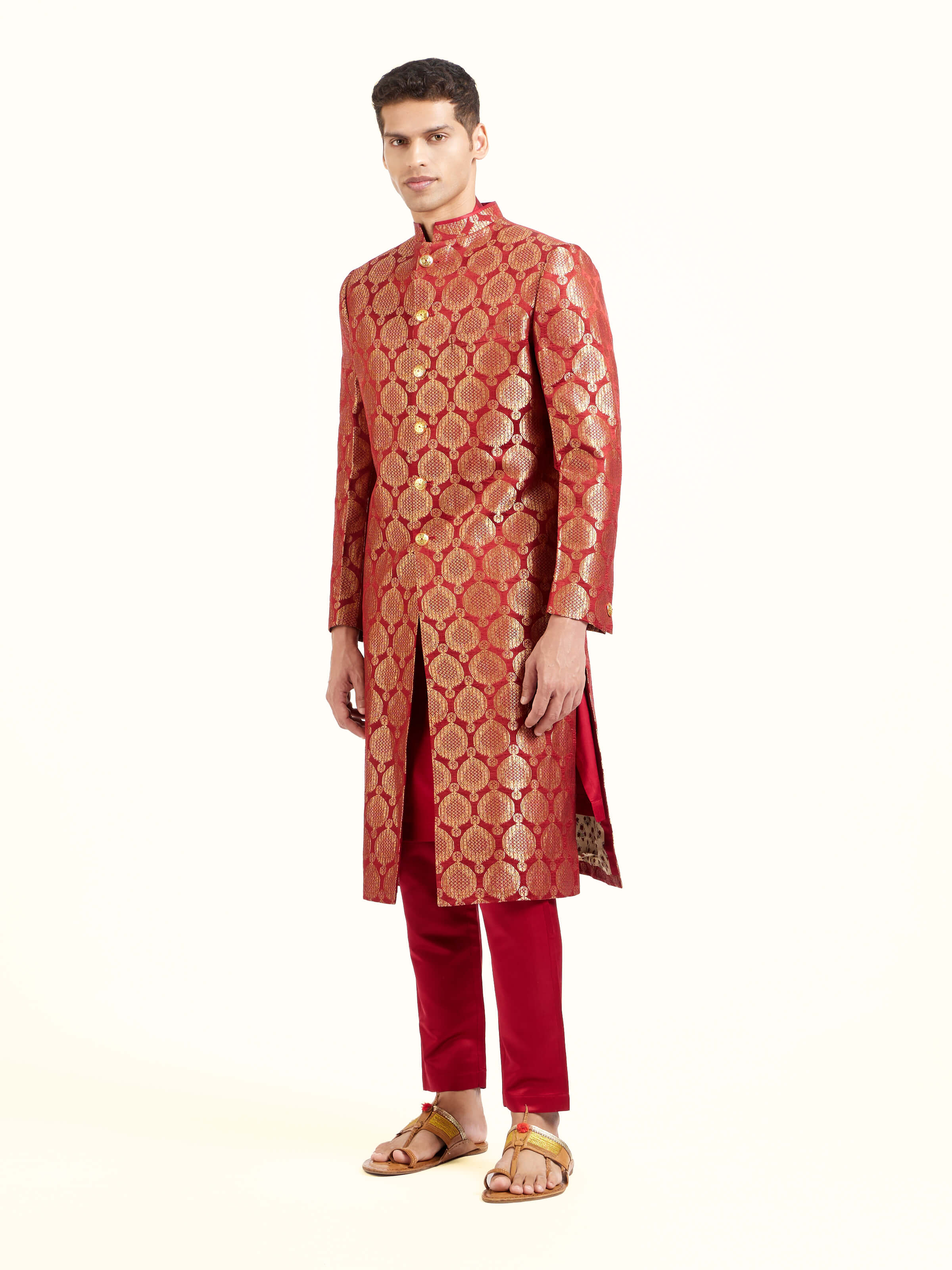 Side view of maroon silk Banarasi butidar sherwani with elegant silhouette