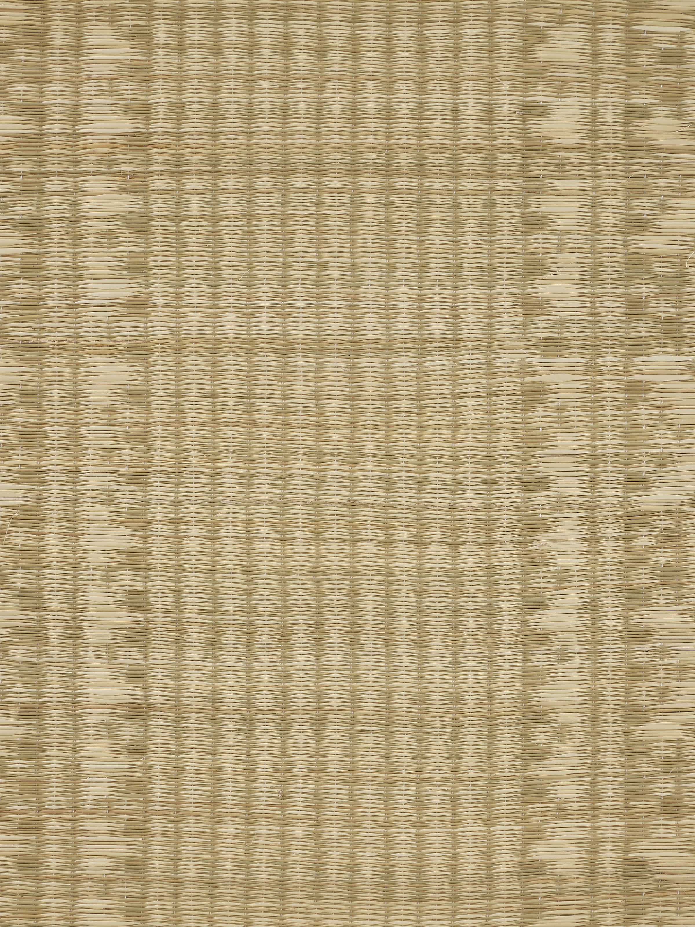 Side view emphasizing the woven craftsmanship and natural fibre quality