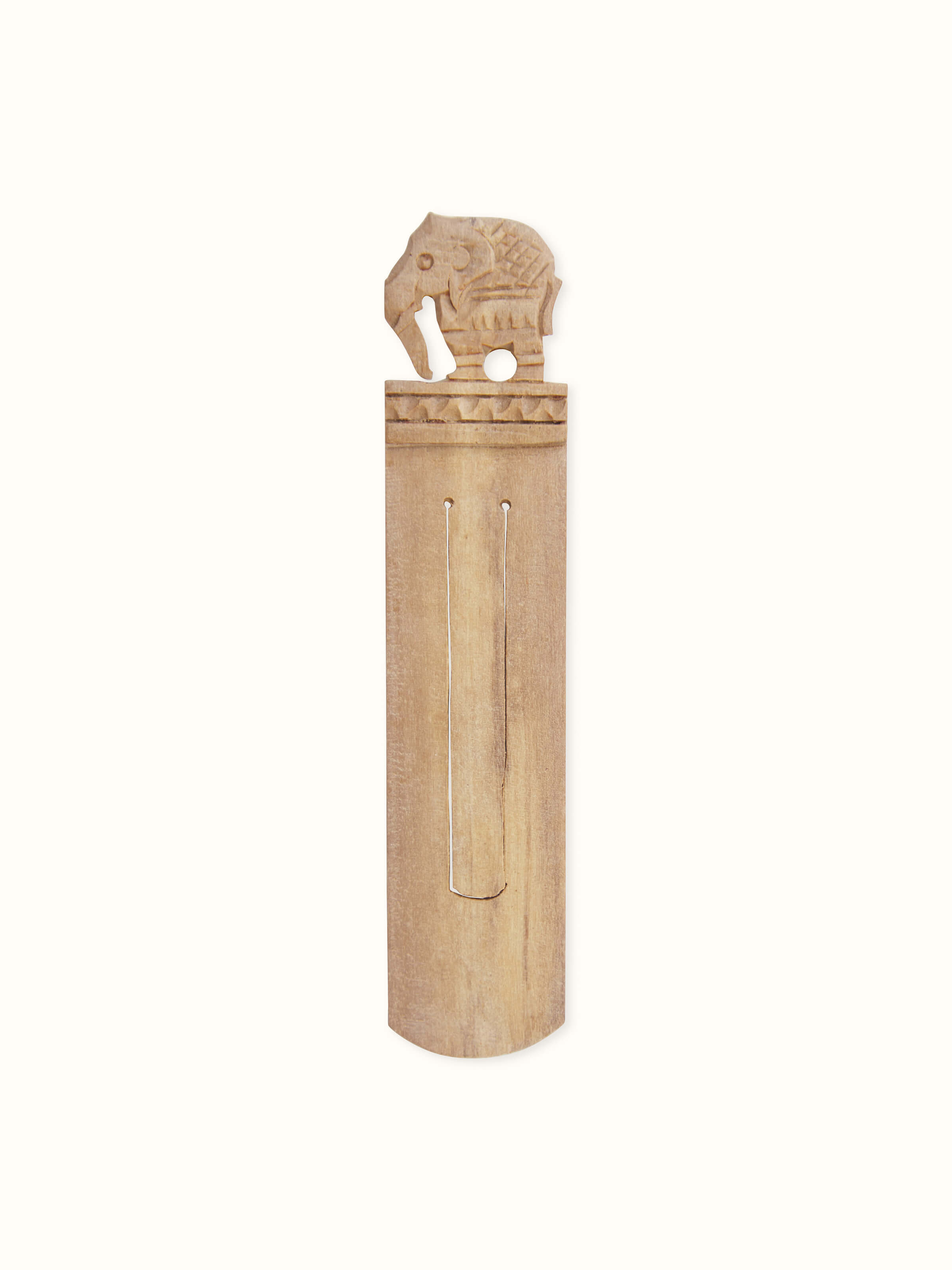 Overhead view of Carved Sandalwood Bookmark showcasing its elegant design and smooth finish.