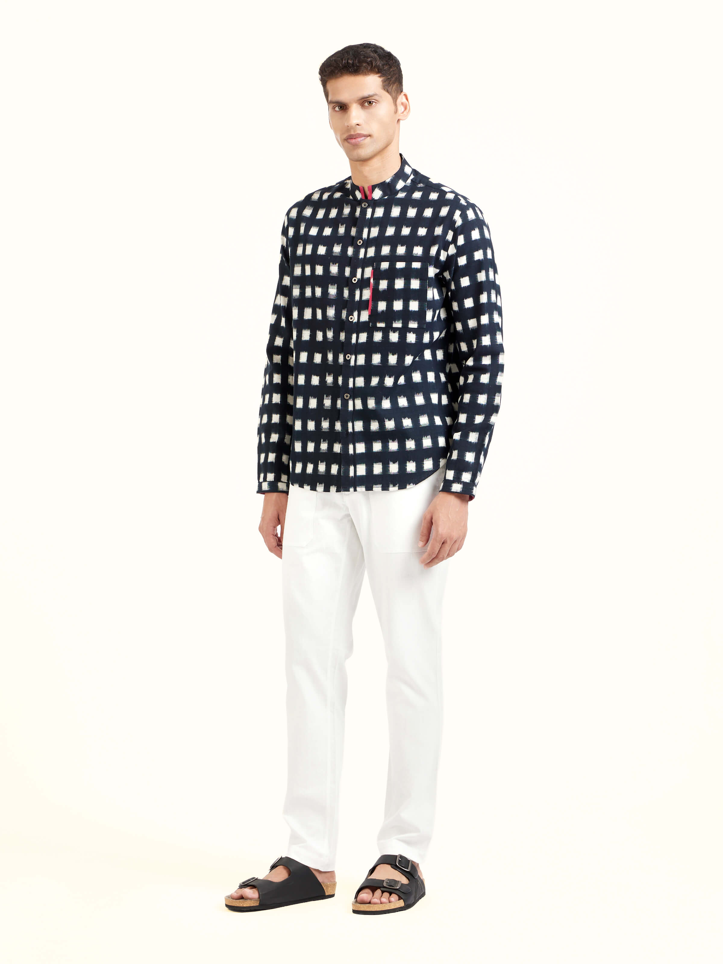 Side view of black cotton Telangana Ikat shirt showcasing relaxed fit